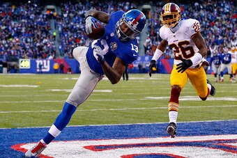 EAST RUTHERFORD, NJ - DECEMBER 14:  Odell Beckham Jr. #13 of the New York Giants attempts to score a 30 yard touchdown that was nullified due to a penalty in the fourth quarter during their game against the Washington Redskins at MetLife Stadium on Decemb