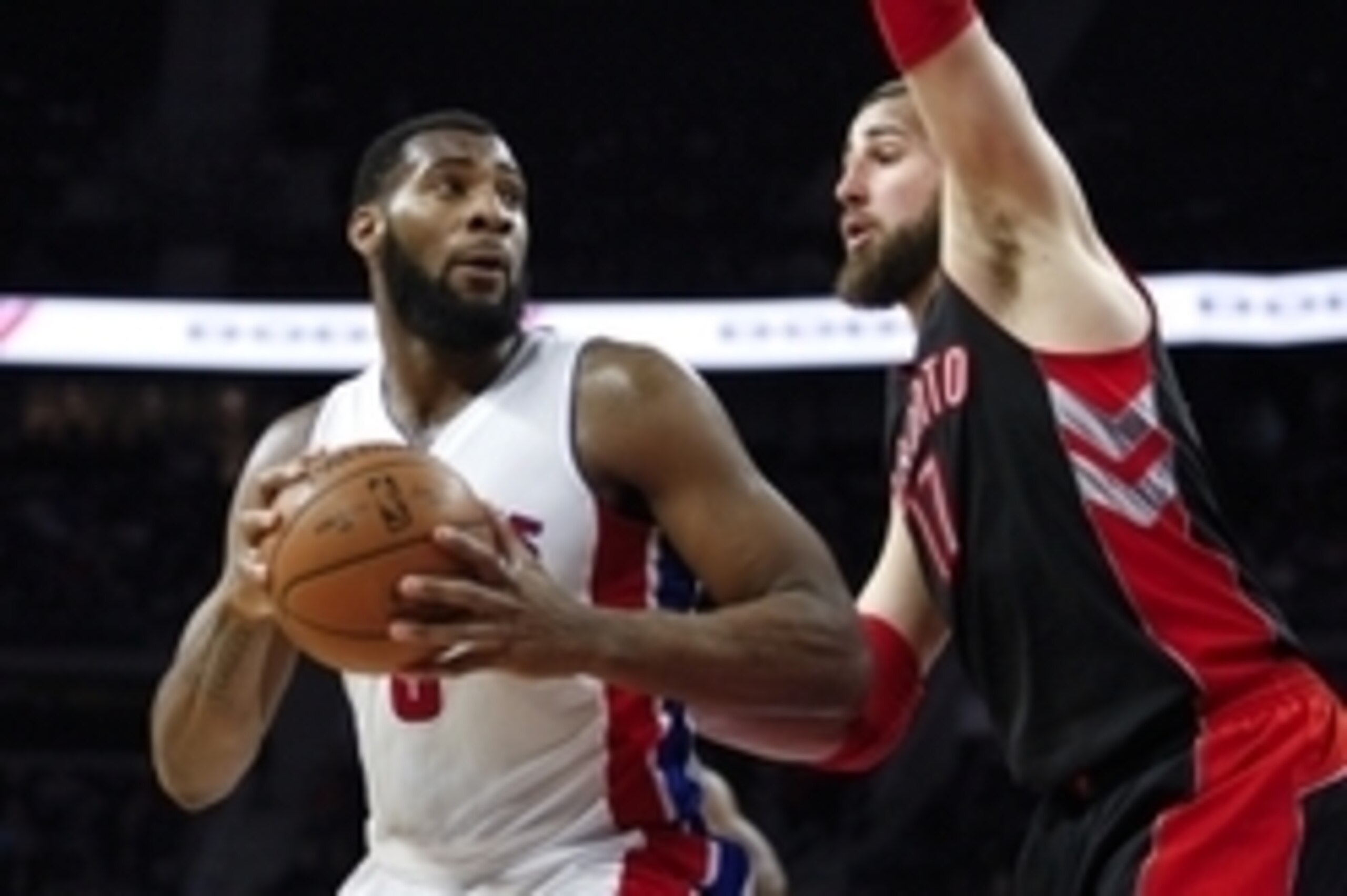 Mar 24, 2015; Auburn Hills, MI, USA; Detroit Pistons center Andre Drummond (0) looks to pass the ball as Toronto Raptors center Jonas Valanciunas (17) defends during the third quarter at The Palace of Auburn Hills. The Pistons won 108-104. Mandatory Credi