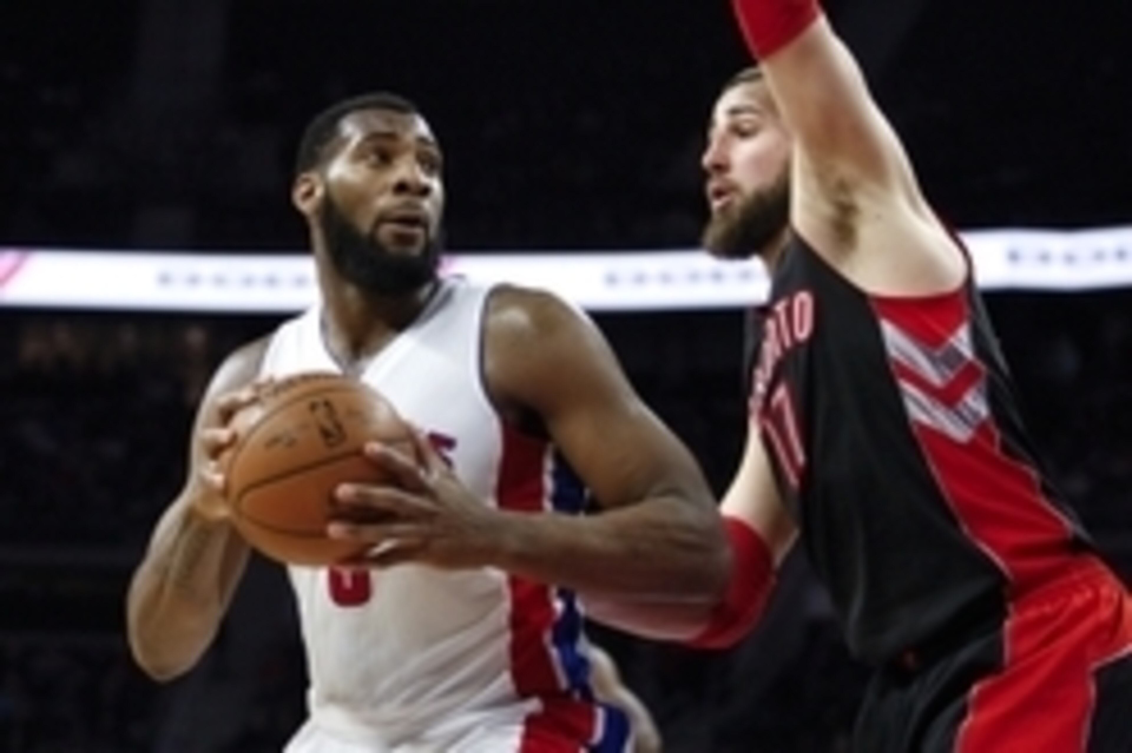 Mar 24, 2015; Auburn Hills, MI, USA; Detroit Pistons center Andre Drummond (0) looks to pass the ball as Toronto Raptors center Jonas Valanciunas (17) defends during the third quarter at The Palace of Auburn Hills. The Pistons won 108-104. Mandatory Credi