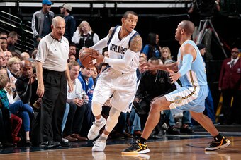 DALLAS, TX - JANUARY 16: Monta Ellis #11 of the Dallas Mavericks handles the ball against the Denver Nuggets on January 16, 2015 at the American Airlines Center in Dallas, Texas. NOTE TO USER: User expressly acknowledges and agrees that, by downloading an