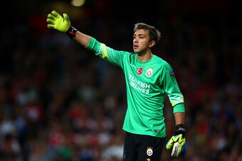 LONDON, ENGLAND - OCTOBER 01:  Fernando Muslera of Galatasaray AS signals during the UEFA Champions League group D match between Arsenal FC and Galatasaray AS at Emirates Stadium on October 1, 2014 in London, United Kingdom.  (Photo by Paul Gilham/Getty I