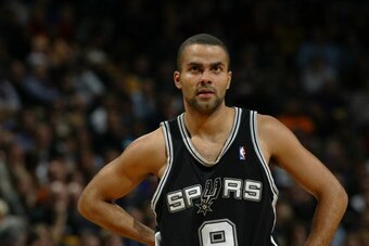 MILWAUKEE - DECEMBER 20:  Tony Parker #9 of the San Antonio Spurs stands on the court during the game against the Milwaukee Bucks on December 20, 2005 at the Bradley Center in Milwaukee, Wisconsin. The Bucks won 109-107 in overtime. NOTE TO USER: User exp
