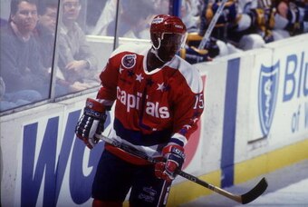 27 JANUARY 1993:  REGGIE SAVAGE OF THE WASHINGTON CAPITALS SKATING DURING A BREAK IN THE ACTION IN A GAME AGAINST THE BUFFALO SABRES.