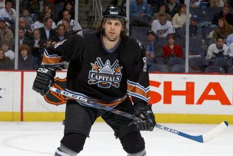 WASHINGTON - MARCH 8:  Josef Boumedienne #2 of the Washington Capitals readies for a faceoff against the Ottawa Senators on March 8, 2004 at the MCI Center in Washington, D.C.  The Senators defeated the Capitals 4-1.  (Photo by Mitchell Layton/Getty Image