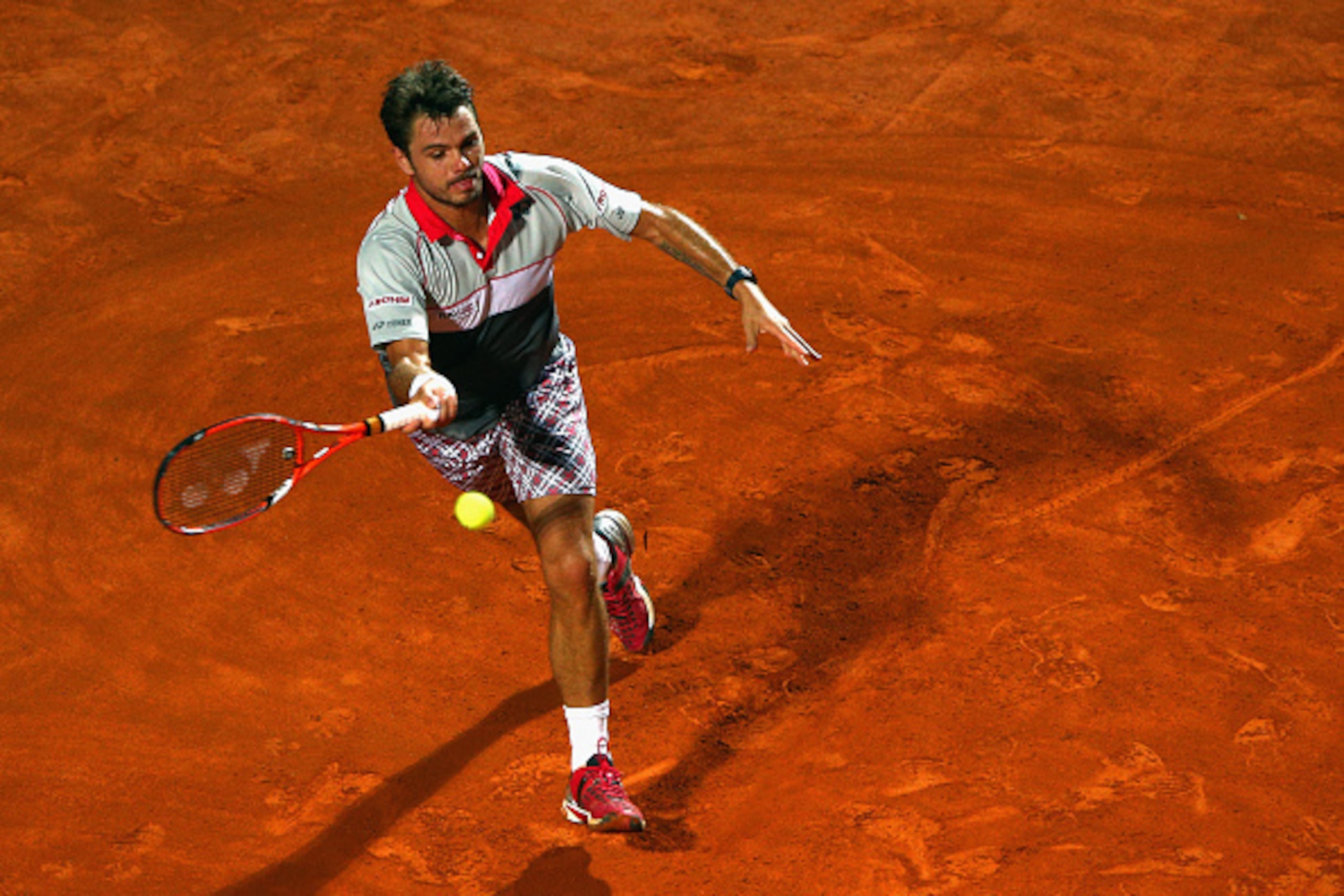 ROME, ITALY - MAY 16:  Stan Wawrinka of switzerland in action during his Men's Semi Final match against Roger Federer of Switzerland on Day Seven of The Internazionali BNL d'Italia 2015 at the Foro Italico on May 16, 2015 in Rome, Italy.  (Photo by Ian Wa