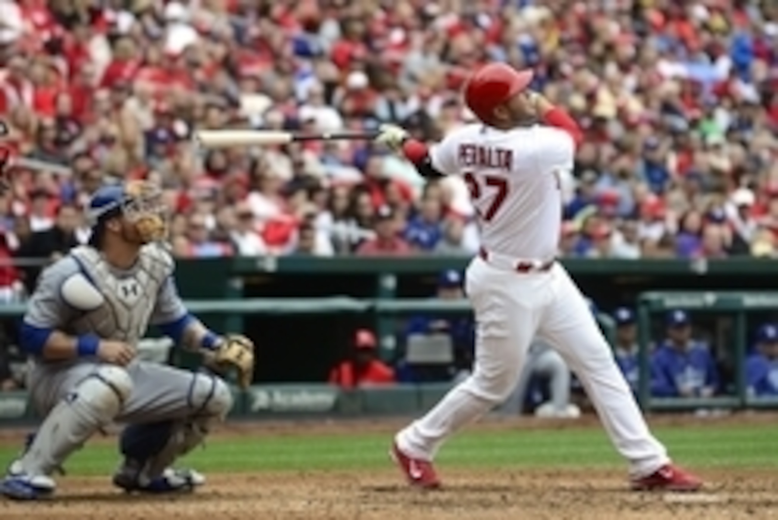 May 31, 2015; St. Louis, MO, USA; St. Louis Cardinals shortstop Jhonny Peralta (27) hits a one run single off of Los Angeles Dodgers relief pitcher Yimi Garcia (not pictured) during the eighth inning at Busch Stadium. The Cardinals defeated the Dodgers 3-
