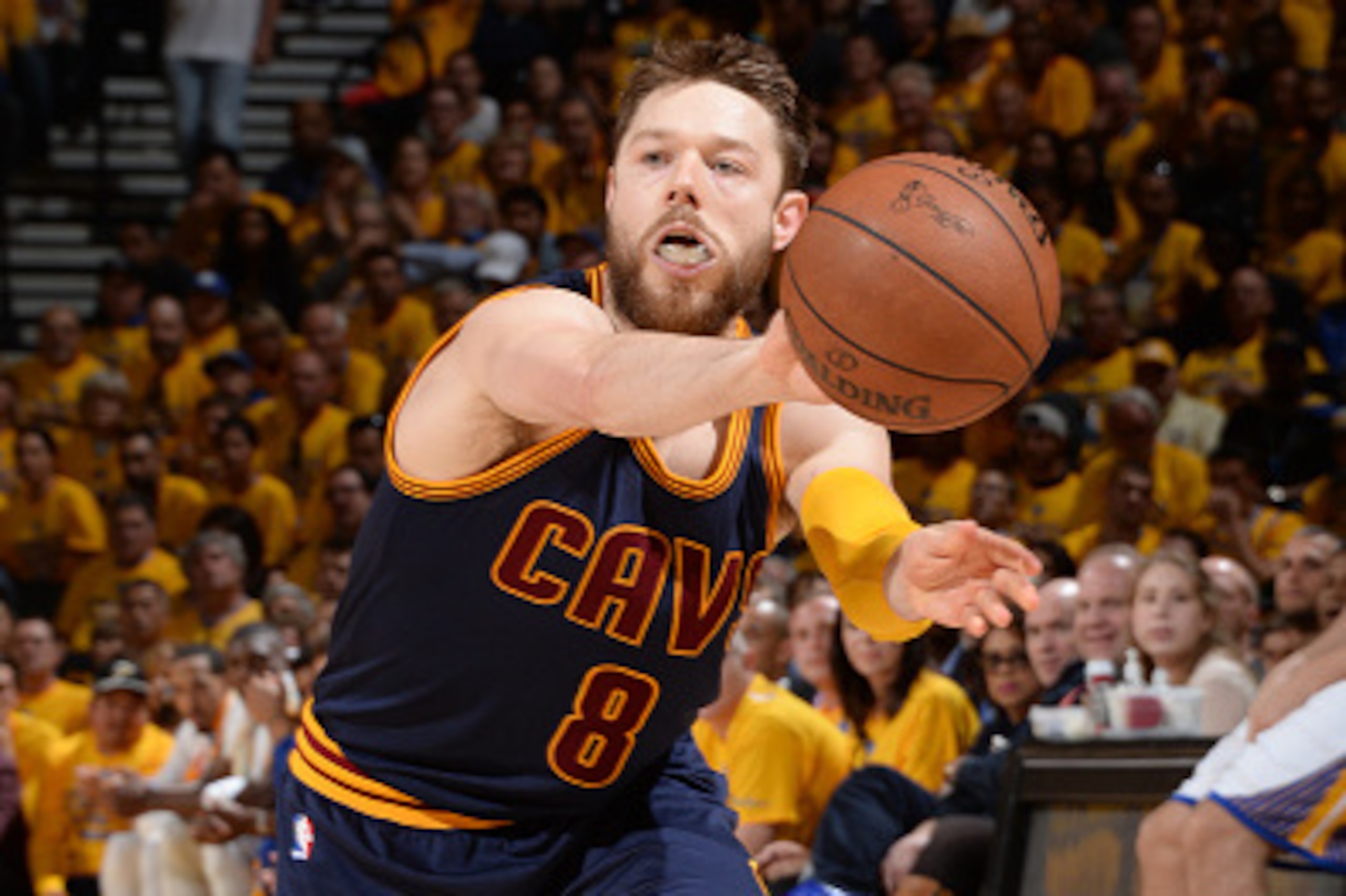 OAKLAND, CA - JUNE 4: Matthew Dellavedova #8 of the Cleveland Cavaliers passes the basketball during Game One of the 2015 NBA Finals on June 4, 2015 at Oracle Arena in Oakland, California. NOTE TO USER: User expressly acknowledges and agrees that, by down