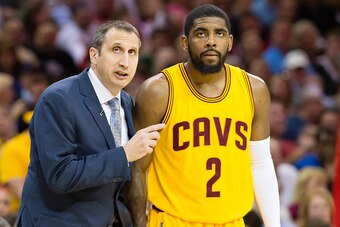 CLEVELAND, OH - MAY 6: Head coach David Blatt of the Cleveland Cavaliers talks with Kyrie Irving #2 in the first half against the Chicago Bulls during Game Two in the Eastern Conference Semifinals of the 2015 NBA Playoffs 2015 at Quicken Loans Arena on Ma