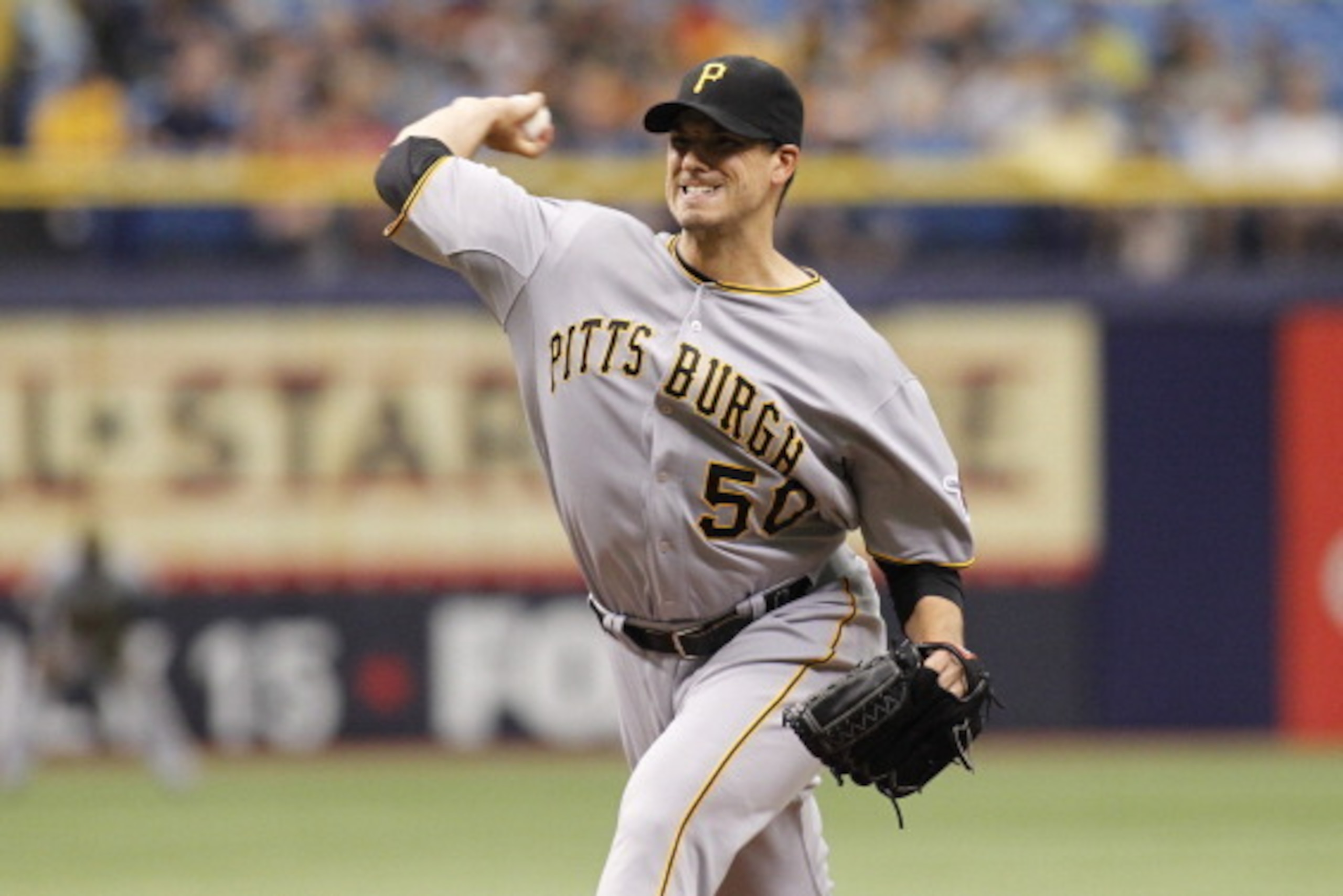 ST. PETERSBURG, FL - JUNE 25:  Charlie Morton #50 of the Pittsburgh Pirates pitches during the first inning of a game against the Tampa Bay Rays on June 25, 2014 at Tropicana Field in St. Petersburg, Florida.  (Photo by Brian Blanco/Getty Images)