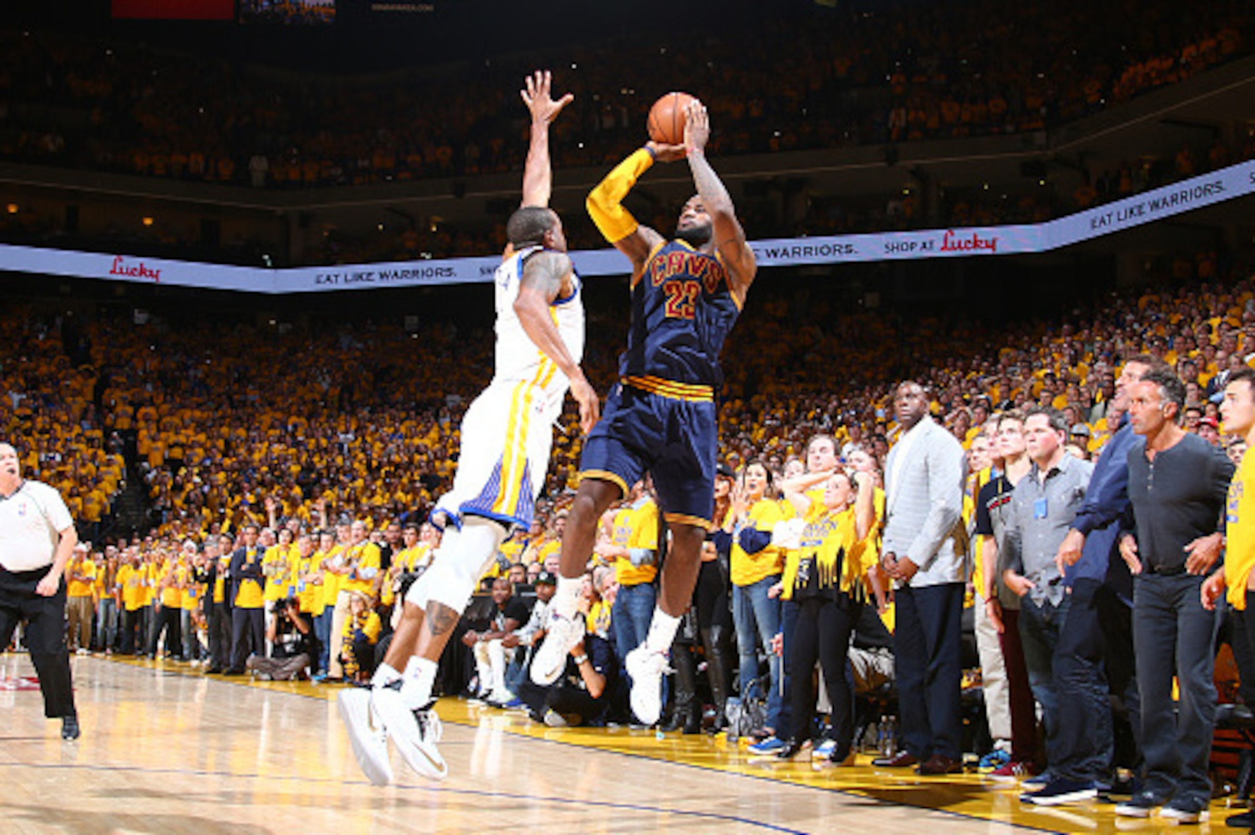OAKLAND, CA - JUNE 4: LeBron James #23 of the Cleveland Cavaliers shoots against Andre Iguodala #9 of the Golden State Warriors during Game One of the 2015 NBA Finals on June 4, 2015 at Oracle Arena in Oakland, California. NOTE TO USER: User expressly ack