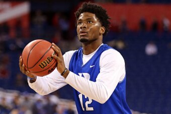 INDIANAPOLIS, IN - APRIL 03: Justise Winslow #12 of the Duke Blue Devils prepares to shoot during practice for the NCAA Men's Final Four at Lucas Oil Stadium on April 3, 2015 in Indianapolis, Indiana.  (Photo by Streeter Lecka/Getty Images)