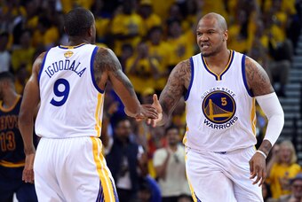 Jun 4, 2015; Oakland, CA, USA; Golden State Warriors center Marreese Speights (5) celebrates worth Golden State Warriors guard Andre Iguodala (9) during the second quarter in game one of the NBA Finals at Oracle Arena. Mandatory Credit: Kyle Terada-USA TO