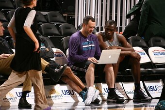 SALT LAKE CITY, UT - MARCH 16: Bismack Biyombo #8 of the Charlotte Hornets looks at footage before a game against the Utah Jazz on March 16, 2015 at EnergySolutions Arena in Salt Lake City, Utah. NOTE TO USER: User expressly acknowledges and agrees that, 