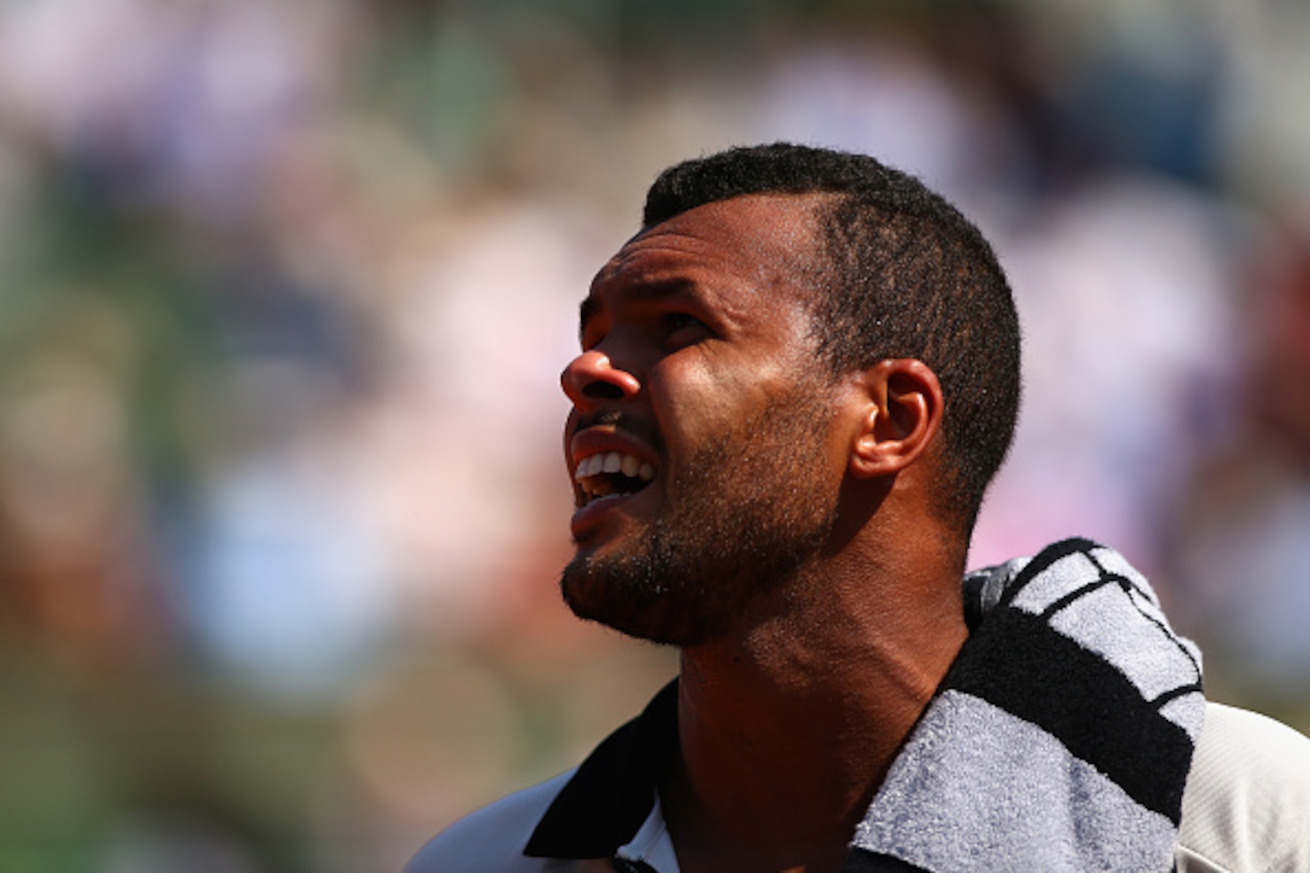 PARIS, FRANCE - JUNE 05: Jo-Wilfried Tsonga of France looks on in his Men's Semi Final match against Stanislas Wawrinka of Switzerland on day thirteen of the 2015 French Open at Roland Garros on June 5, 2015 in Paris, France. (Photo by Dan Istitene/Gett PARIS, FRANCE - JUNE 05: Jo-Wilfried Tsonga of France looks on in his Men's Semi Final match against Stanislas Wawrinka of Switzerland on day thirteen of the 2015 French Open at Roland Garros on June 5, 2015 in Paris, France. (Photo by Dan Istitene/Gett