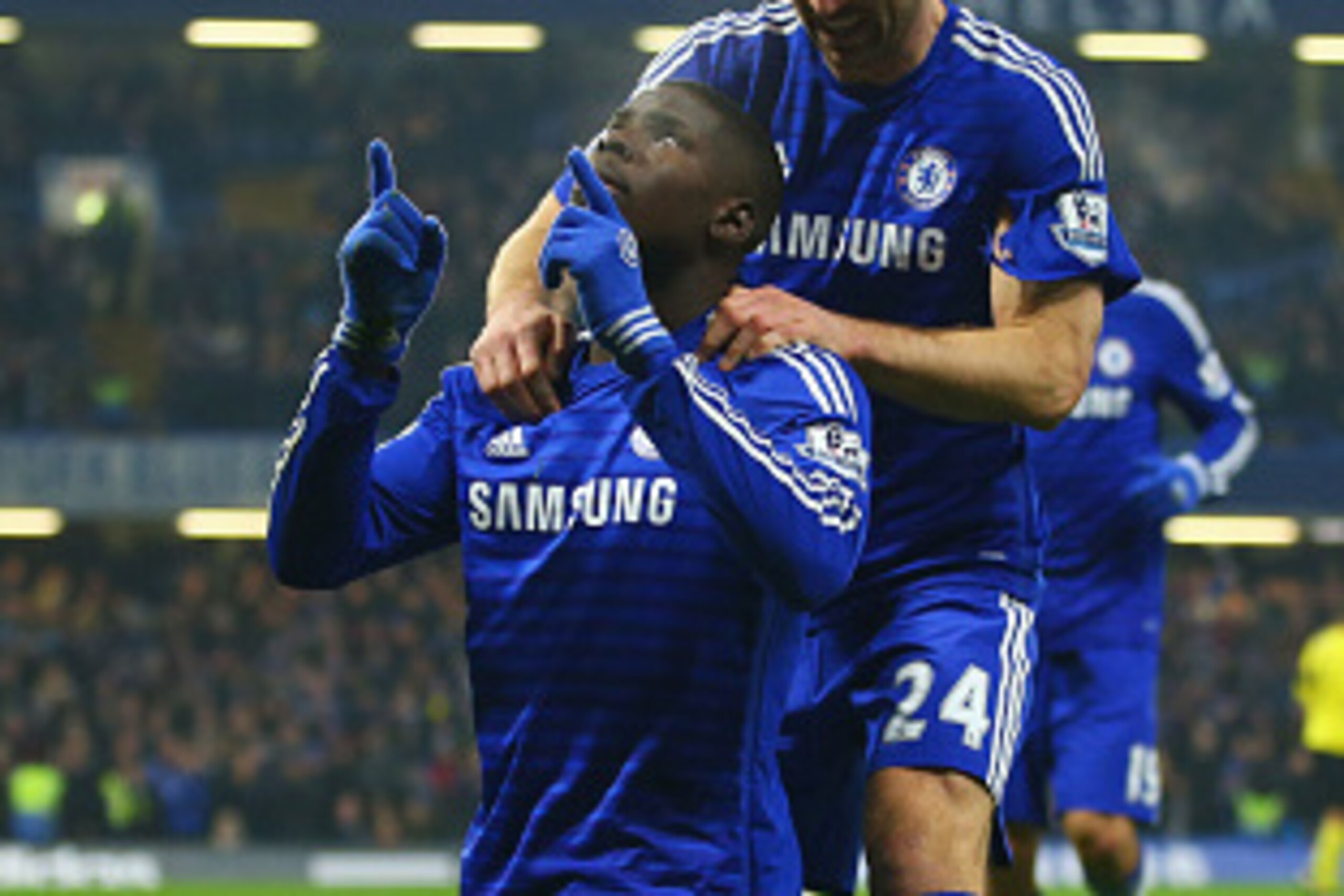 LONDON, ENGLAND - JANUARY 04:  Kurt Zouma of Chelsea (5) celebrates with Gary Cahill (24) as he scores their third goal during the FA Cup Third Round match between Chelsea and Watford at Stamford Bridge on January 4, 2015 in London, England.  (Photo by Ri
