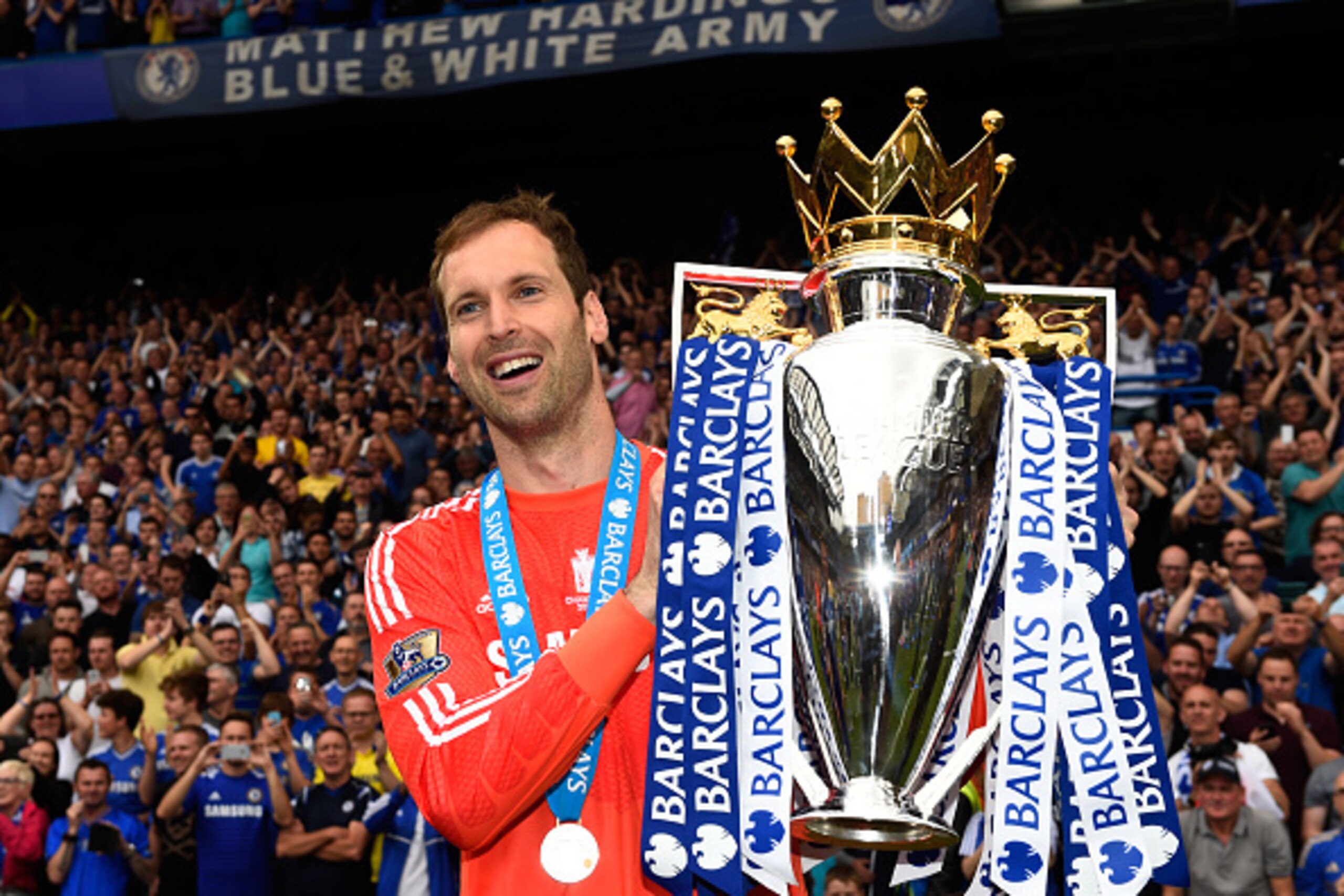 LONDON, ENGLAND - MAY 24:  Petr Cech of Chelsea celebrates with the trophy after the Barclays Premier League match between Chelsea and Sunderland at Stamford Bridge on May 24, 2015 in London, England. Chelsea were crowned Premier League champions.  (Photo