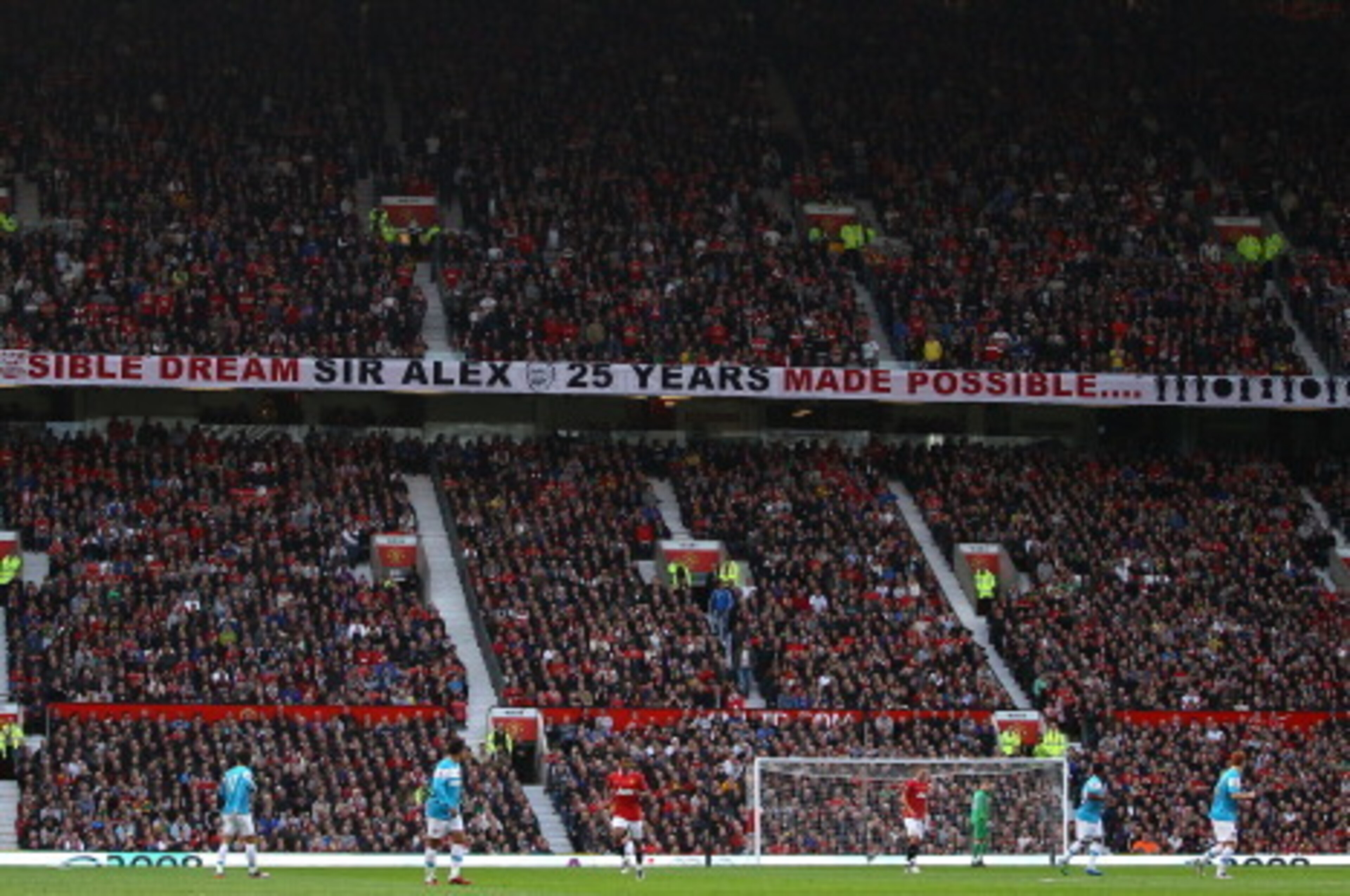 MANCHESTER, ENGLAND - NOVEMBER 05:  A banner in the Stretford End commemerating Sir Alex's 25th year as manager during the Barclays Premier League match between Manchester United and Sunderland at Old Trafford on November 5, 2011 in Manchester, England.  