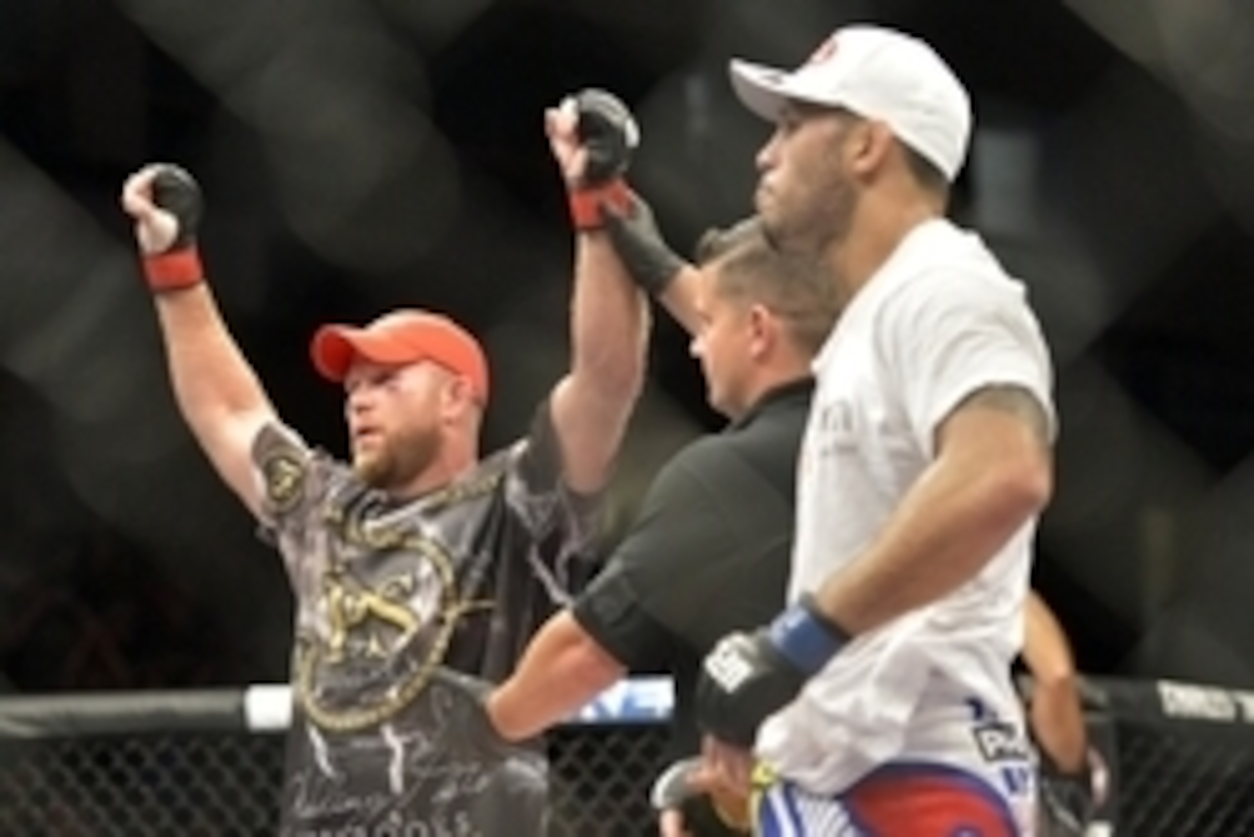Aug 16, 2014; Bangor, ME, USA; Tim Boetsch (red gloves) is victorious over Brad Tavares (blue gloves) by knockout after their middleweight  bout in UFC Fight Night 47 at Cross Insurance Center. Mandatory Credit: Gregory J. Fisher-USA TODAY Sports