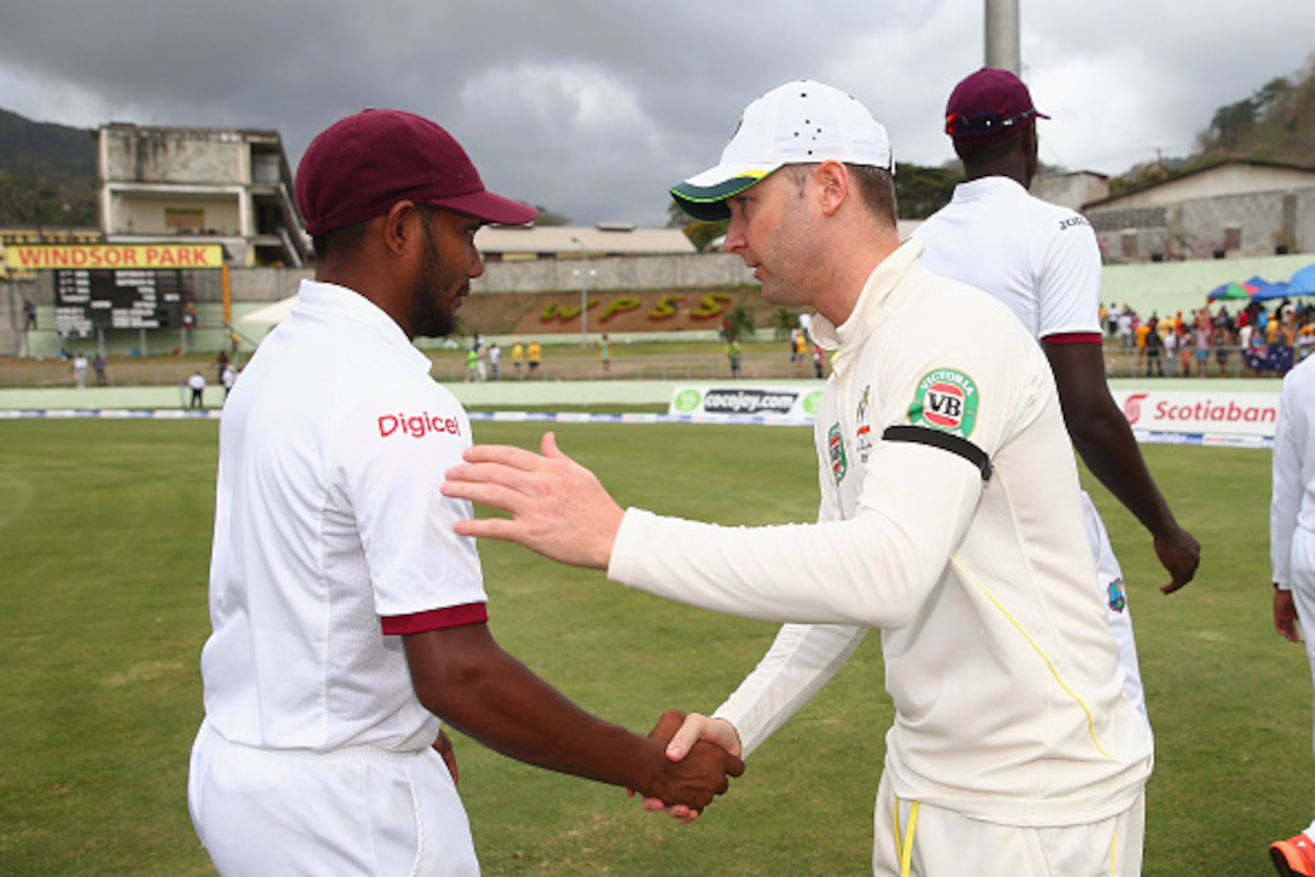 ROSEAU, DOMINICA - JUNE 05:  Devendra Bishoo of West Indies congratulates Michael Clarke of Australia after day three of the First Test match between Australia and the West Indies at Windsor Park on June 5, 2015 in Roseau, Dominica.  (Photo by Ryan Pierse