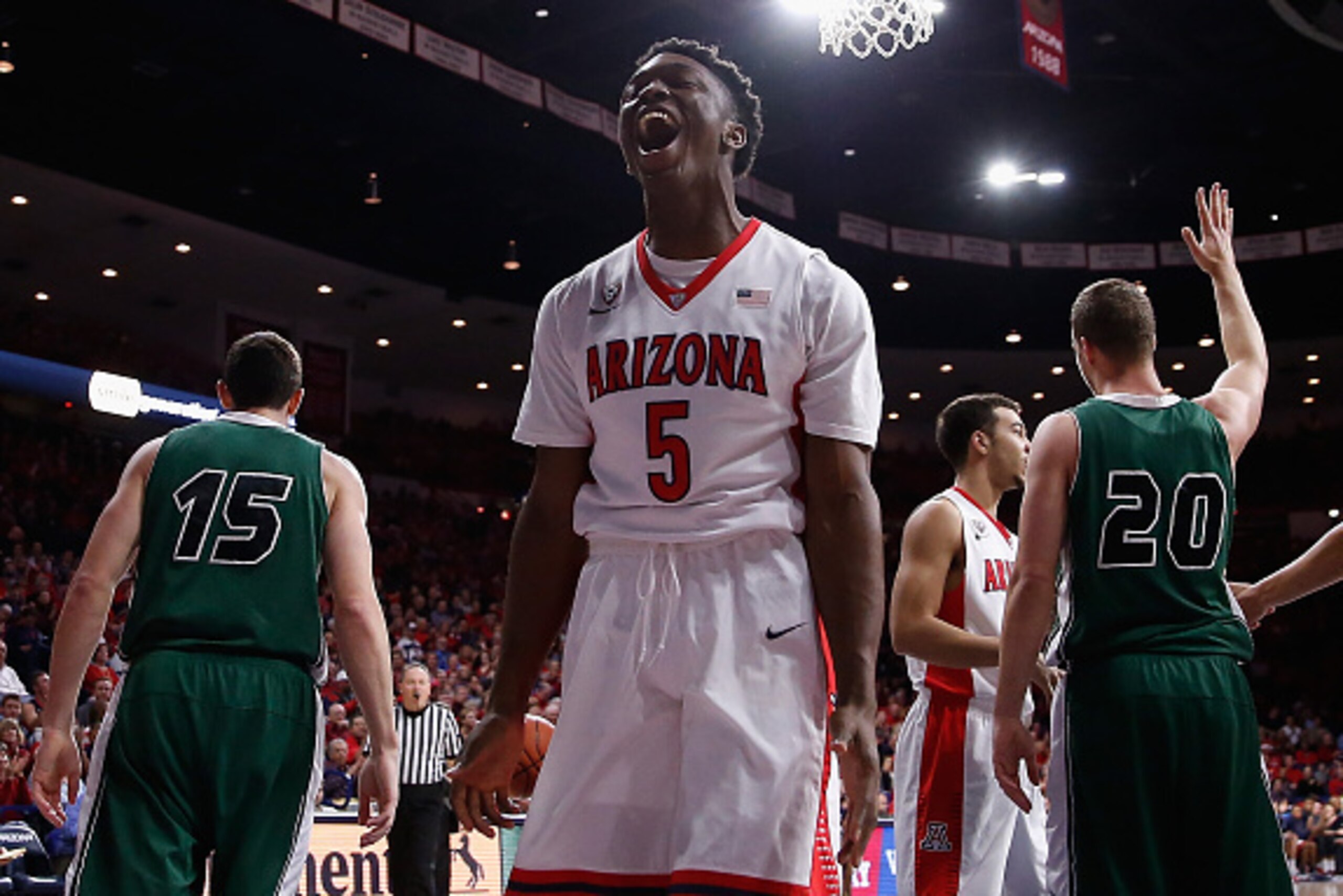 TUCSON, AZ - DECEMBER 09:  Stanley Johnson #5 of the Arizona Wildcats reacts after scoring against the Utah Valley Wolverines during the first half of the college basketball game at McKale Center on December 9, 2014 in Tucson, Arizona.  (Photo by Christia