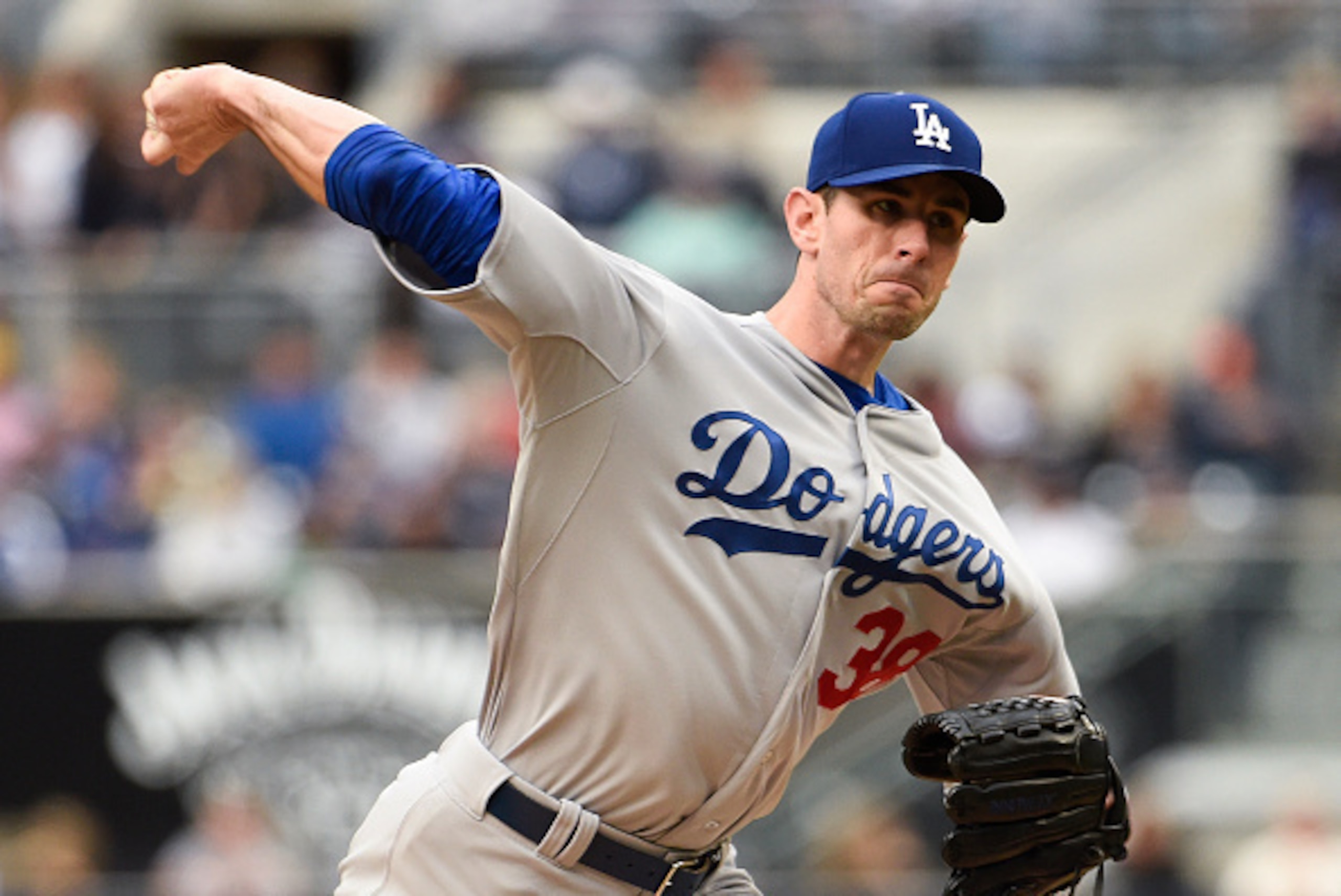 SAN DIEGO, CA - APRIL 25: Brandon McCarthy #38 of the Los Angeles Dodgers pitches during the first inning of a baseball game at Petco Park April 25, 2015 in San Diego, California. (Photo by Denis Poroy/Getty Images)