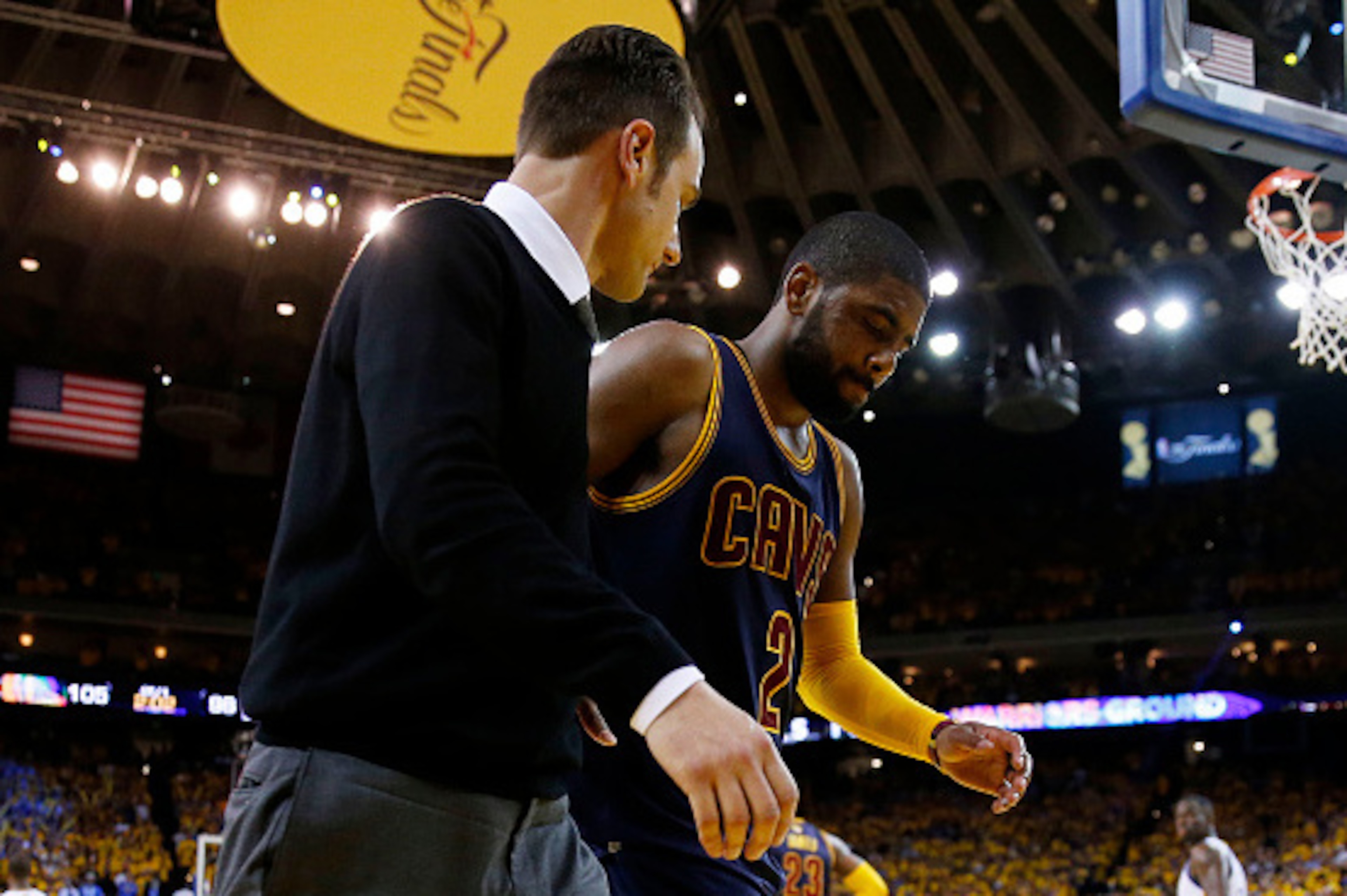 OAKLAND, CA - JUNE 04:  Kyrie Irving #2 of the Cleveland Cavaliers leaves the game injured against the Golden State Warriors during Game One of the 2015 NBA Finals at ORACLE Arena on June 4, 2015 in Oakland, California. NOTE TO USER: User expressly acknow