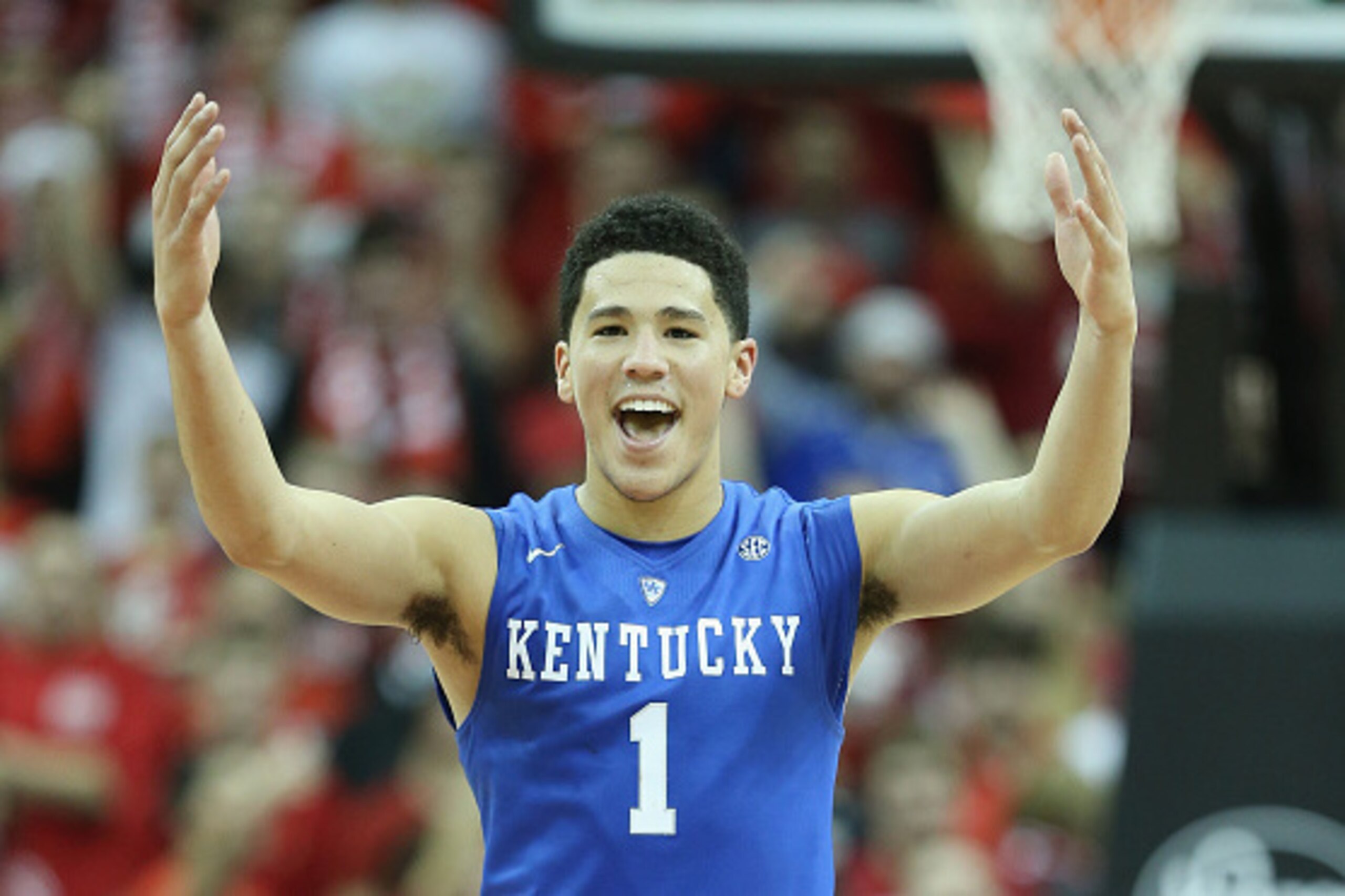 LOUISVILLE, KY - DECEMBER 27:  Devin Booker #1 of the Kentucky Wilcats celebrates during the game against the Louisville Cardinals at KFC YUM! Center on December 27, 2014 in Louisville, Kentucky.  (Photo by Andy Lyons/Getty Images)