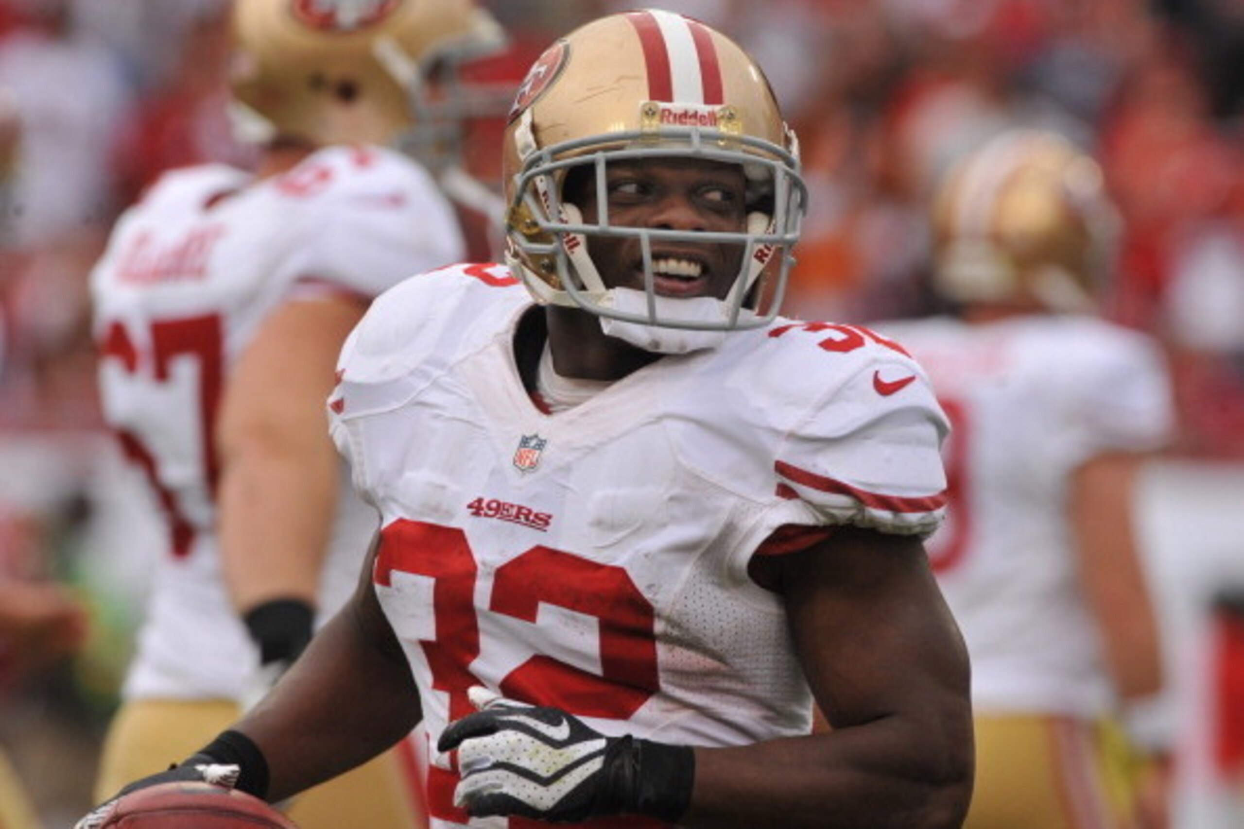 TAMPA, FL - DECEMBER 15: Running back Kendall Hunter #32 of the San Francisco 49ers celebrates after diving for a touchdown after recovering a kickoff fumble against the Tampa Bay Buccaneers December 15, 2013 at Raymond James Stadium in Tampa, Florida. TAMPA, FL - DECEMBER 15: Running back Kendall Hunter #32 of the San Francisco 49ers celebrates after diving for a touchdown after recovering a kickoff fumble against the Tampa Bay Buccaneers December 15, 2013 at Raymond James Stadium in Tampa, Florida.