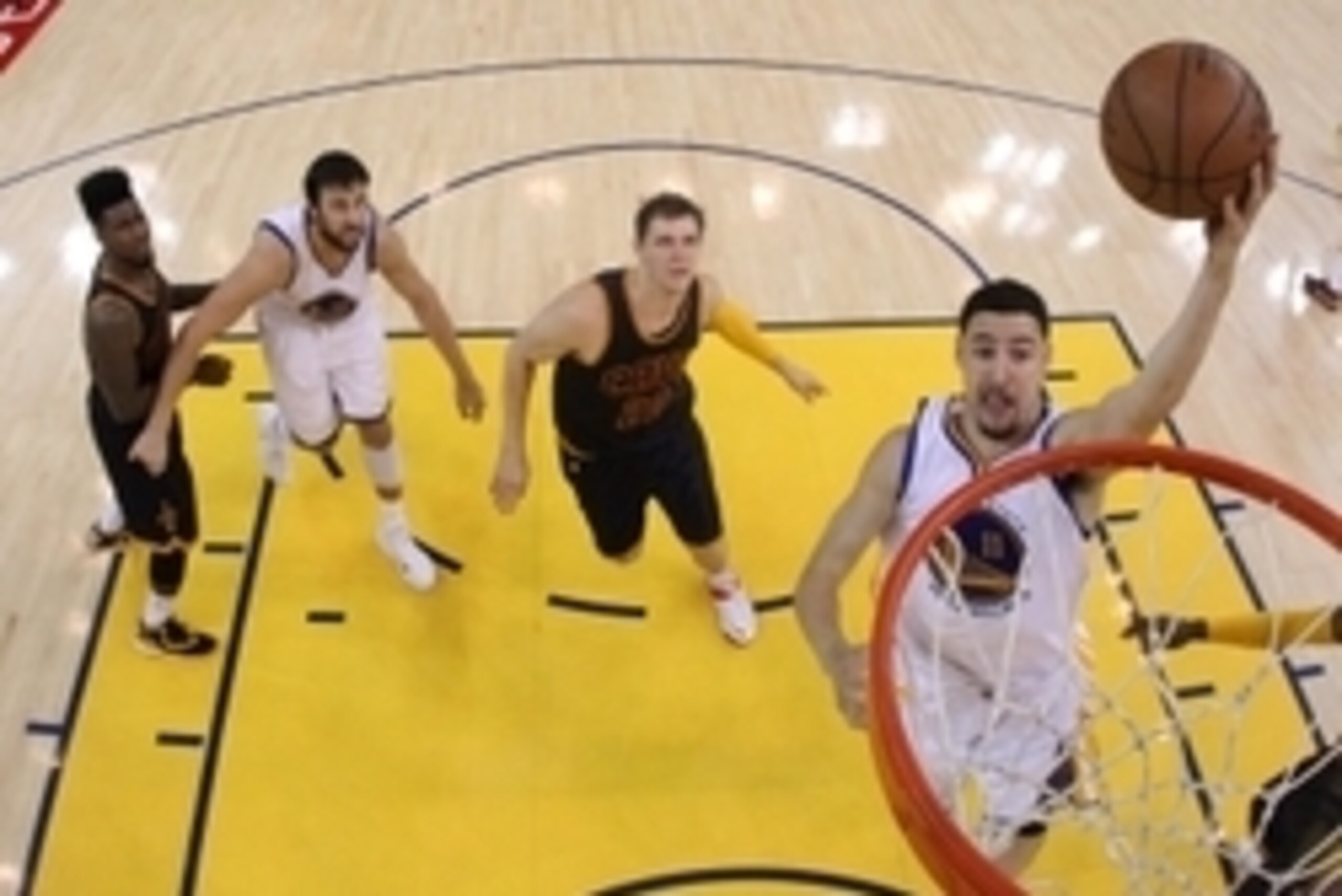 Jun 4, 2015; Oakland, CA, USA; Golden State Warriors guard Klay Thompson (11) shoots the ball against Cleveland Cavaliers center Timofey Mozgov (20) in game one of the NBA Finals at Oracle Arena. Mandatory Credit: Ezra Shaw-Pool Photo via USA TODAY Sports