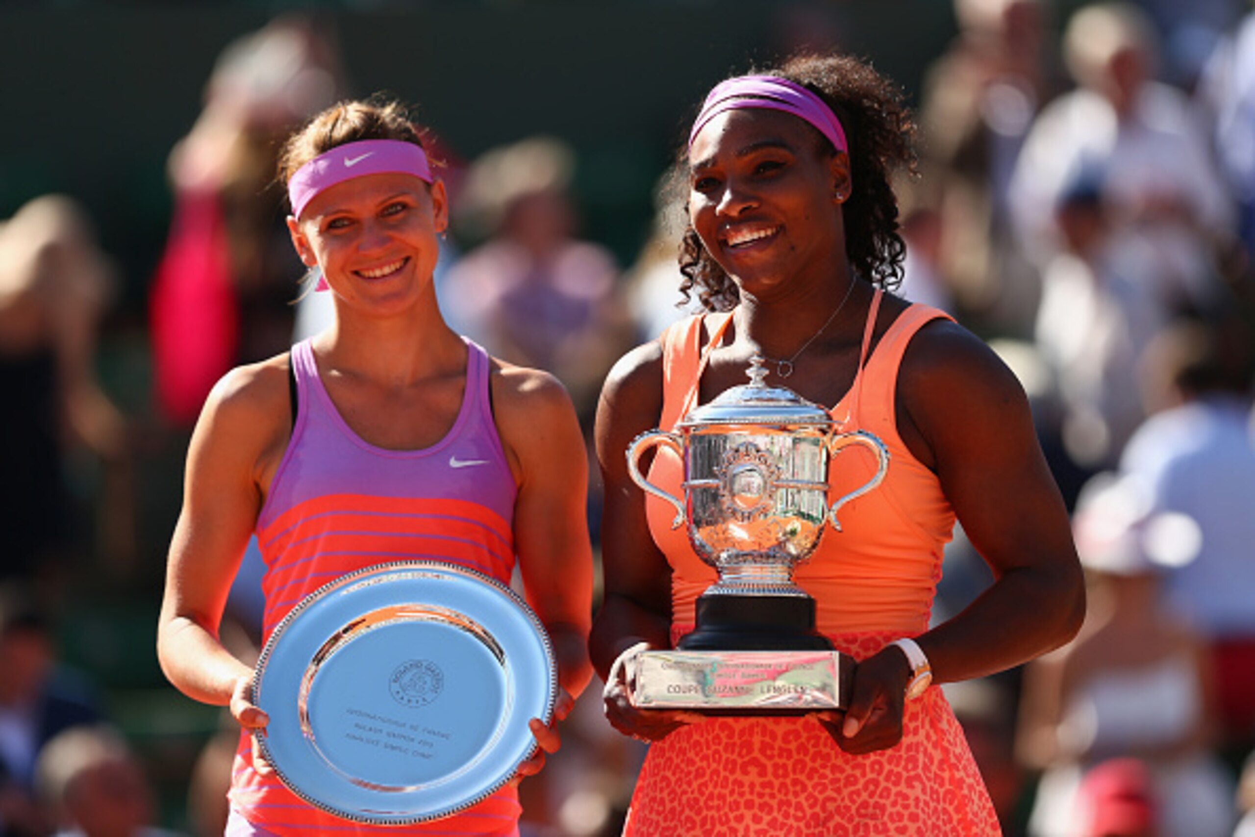 PARIS, FRANCE - JUNE 06:  Runner up Lucie Safarova of Czech Republic and winner Serena Williams of the United States pose with their trophys after  the Women's Singles Final on day fourteen of the 2015 French Open at Roland Garros on June 6, 2015 in Paris