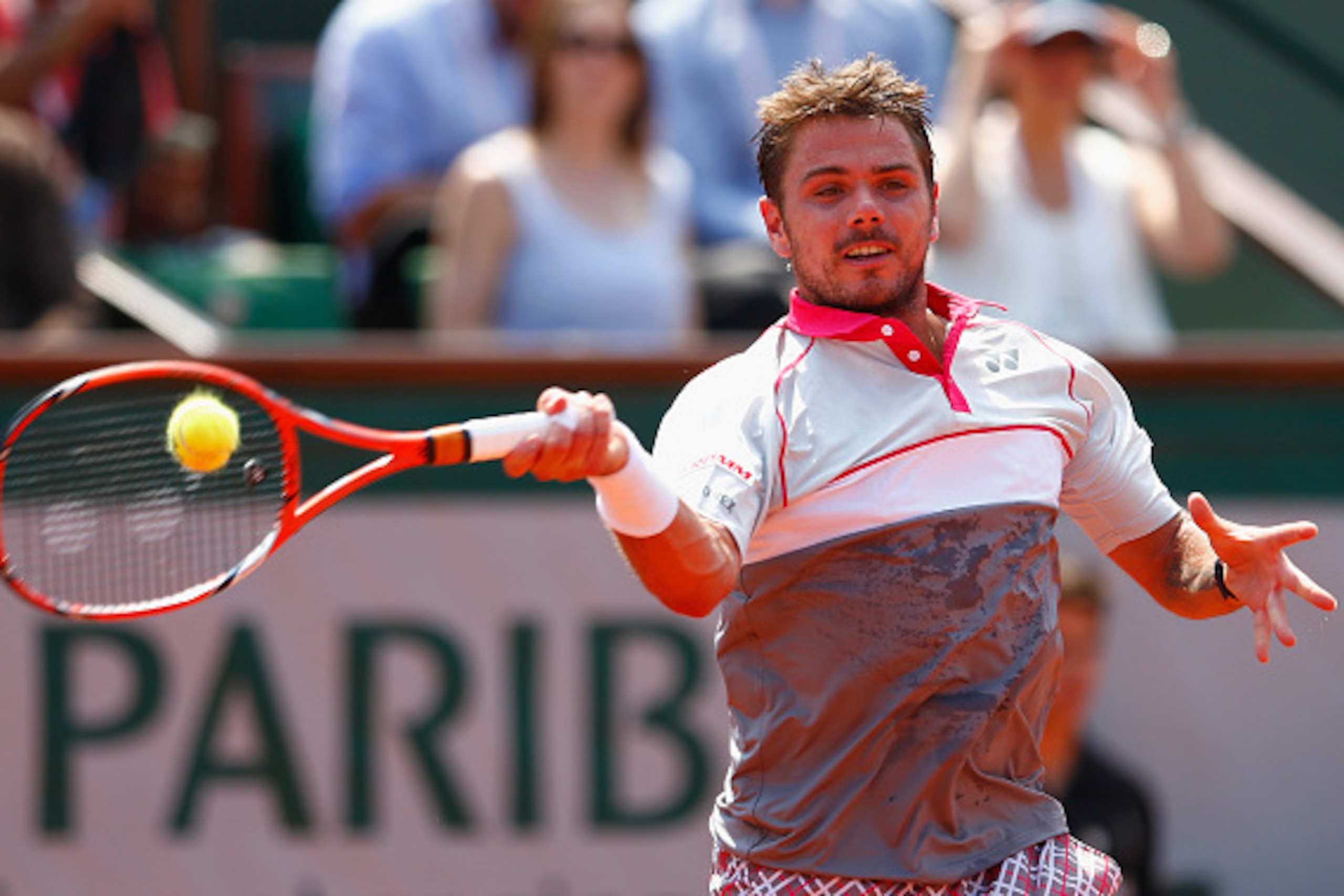 PARIS, FRANCE - JUNE 05: Stanislas Wawrinka of Switzerland returns a shot in his Men's Semi Final against Jo-Wilfried Tsonga of France on day thirteen of the 2015 French Open at Roland Garros on June 5, 2015 in Paris, France. (Photo by Julian Finney/Get PARIS, FRANCE - JUNE 05: Stanislas Wawrinka of Switzerland returns a shot in his Men's Semi Final against Jo-Wilfried Tsonga of France on day thirteen of the 2015 French Open at Roland Garros on June 5, 2015 in Paris, France. (Photo by Julian Finney/Get