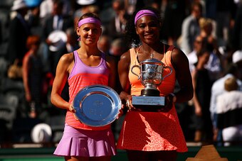 PARIS, FRANCE - JUNE 06:  Runner up Lucie Safarova of Czech Republic and winner Serena Williams of the United States pose with their trophys after  the Women's Singles Final on day fourteen of the 2015 French Open at Roland Garros on June 6, 2015 in Paris