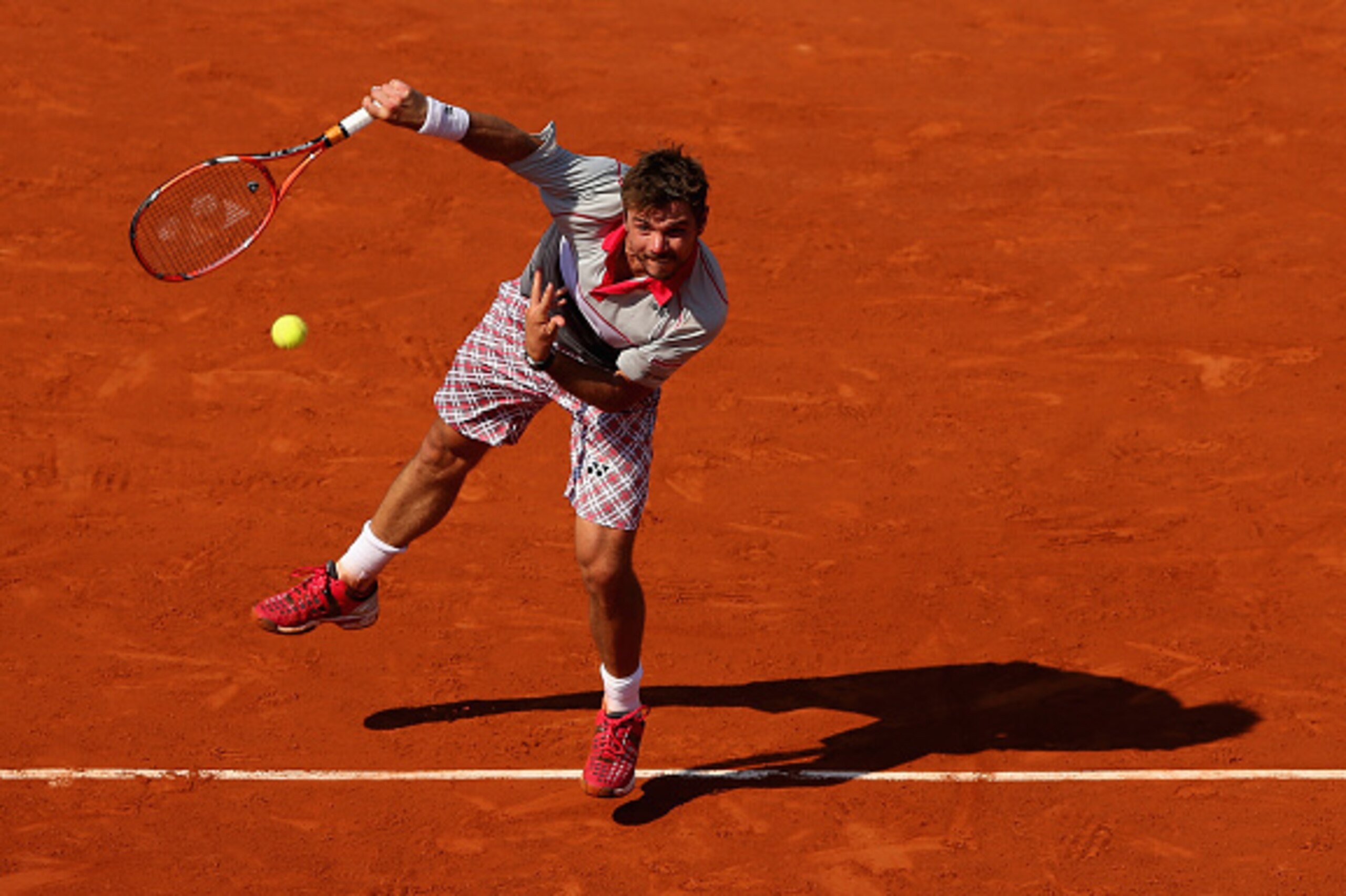 PARIS, FRANCE - JUNE 05:  Stanislas Wawrinka of Switzerland serves in his Men's Semi Final against Jo-Wilfried Tsonga of France on day thirteen of the 2015 French Open at Roland Garros on June 5, 2015 in Paris, France.  (Photo by Clive Brunskill/Getty Ima