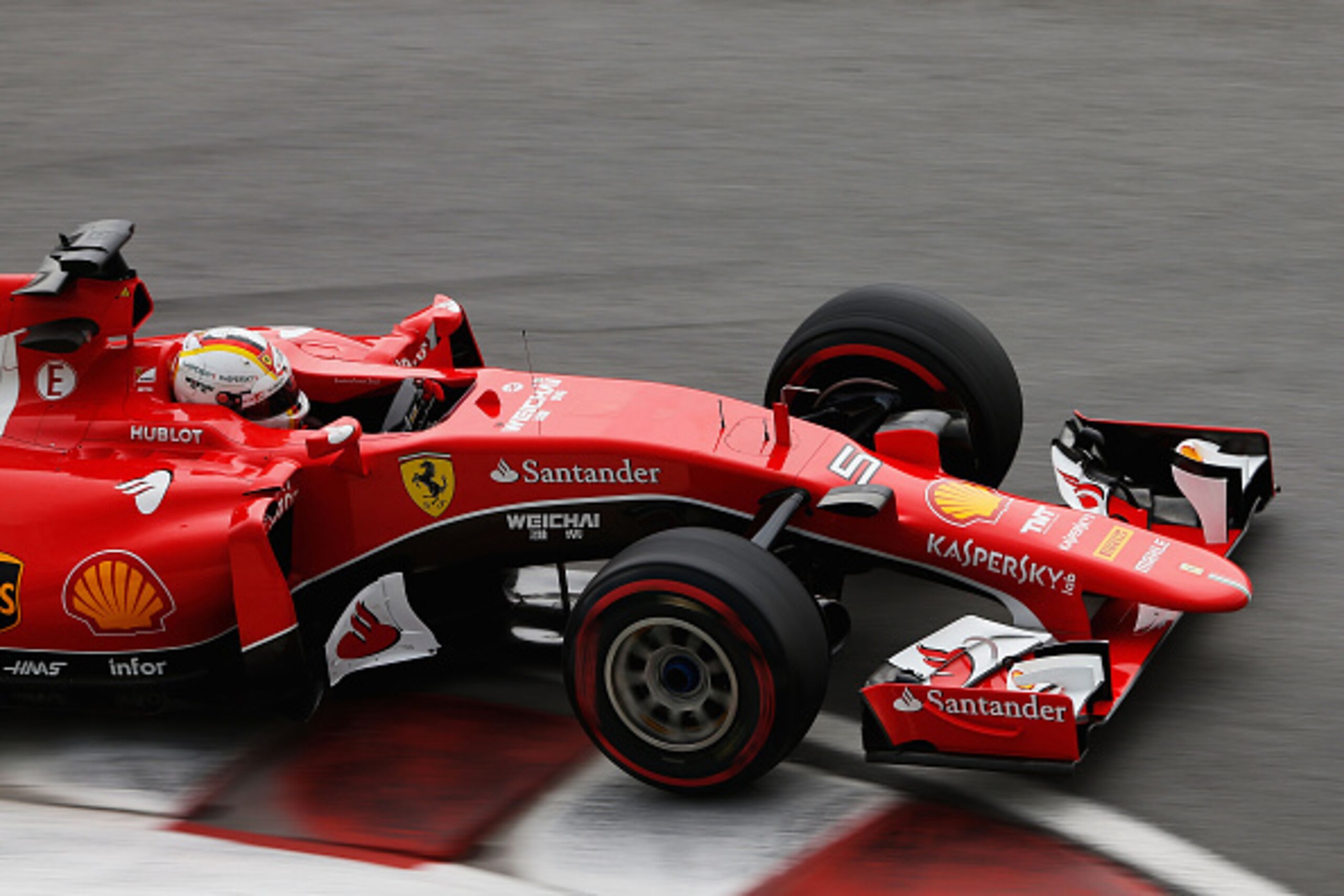 MONTREAL, QC - JUNE 05:  Sebastian Vettel of Germany and Ferrari drives during practice for the Canadian Formula One Grand Prix at Circuit Gilles Villeneuve on June 5, 2015 in Montreal, Canada.  (Photo by Charles Coates/Getty Images)