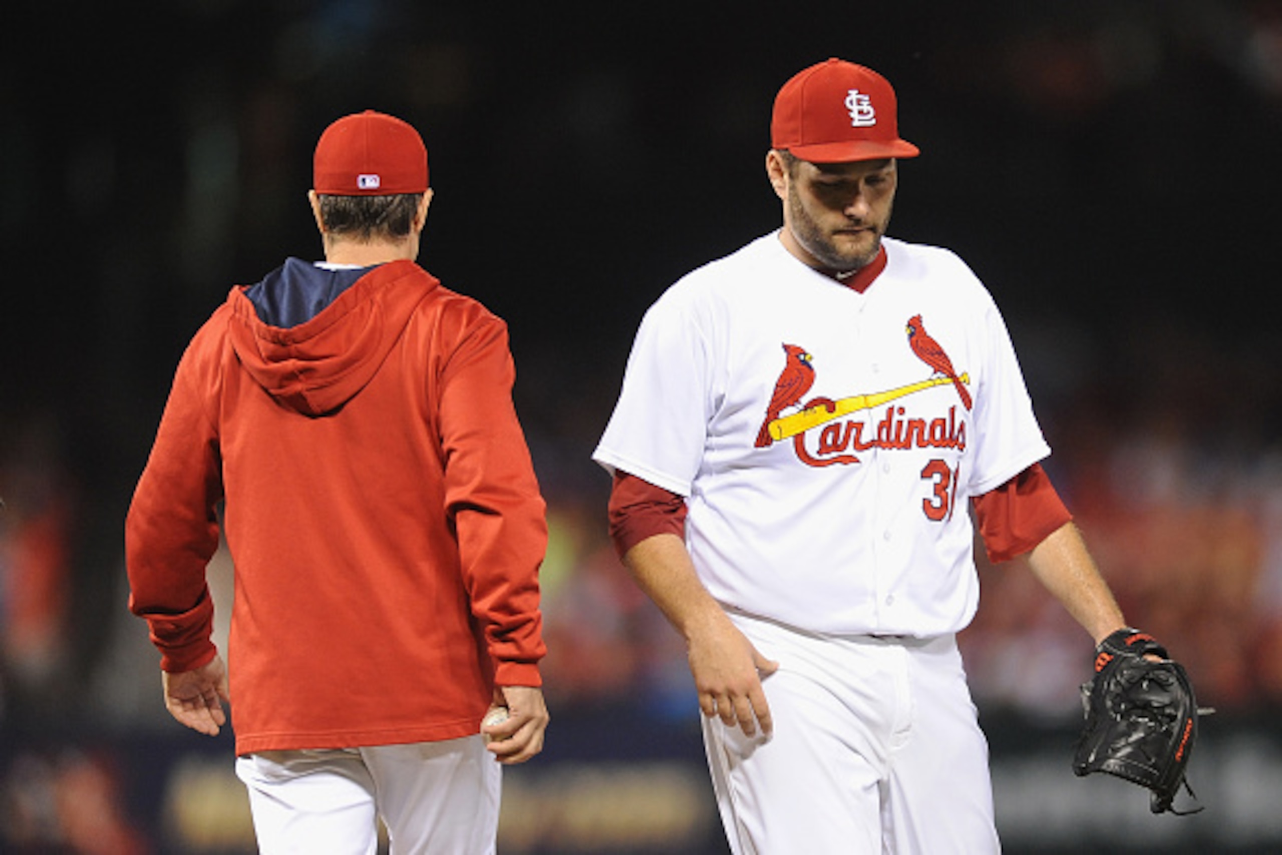 ST. LOUIS, MO - JUNE 2:  Lance Lynn #31 of the St. Louis Cardinals walks to the dugout after being relieved in the eighth inning against the Milwaukee Brewers at Busch Stadium on June 2, 2015 in St. Louis, Missouri.  (Photo by Michael Thomas/Getty Images)