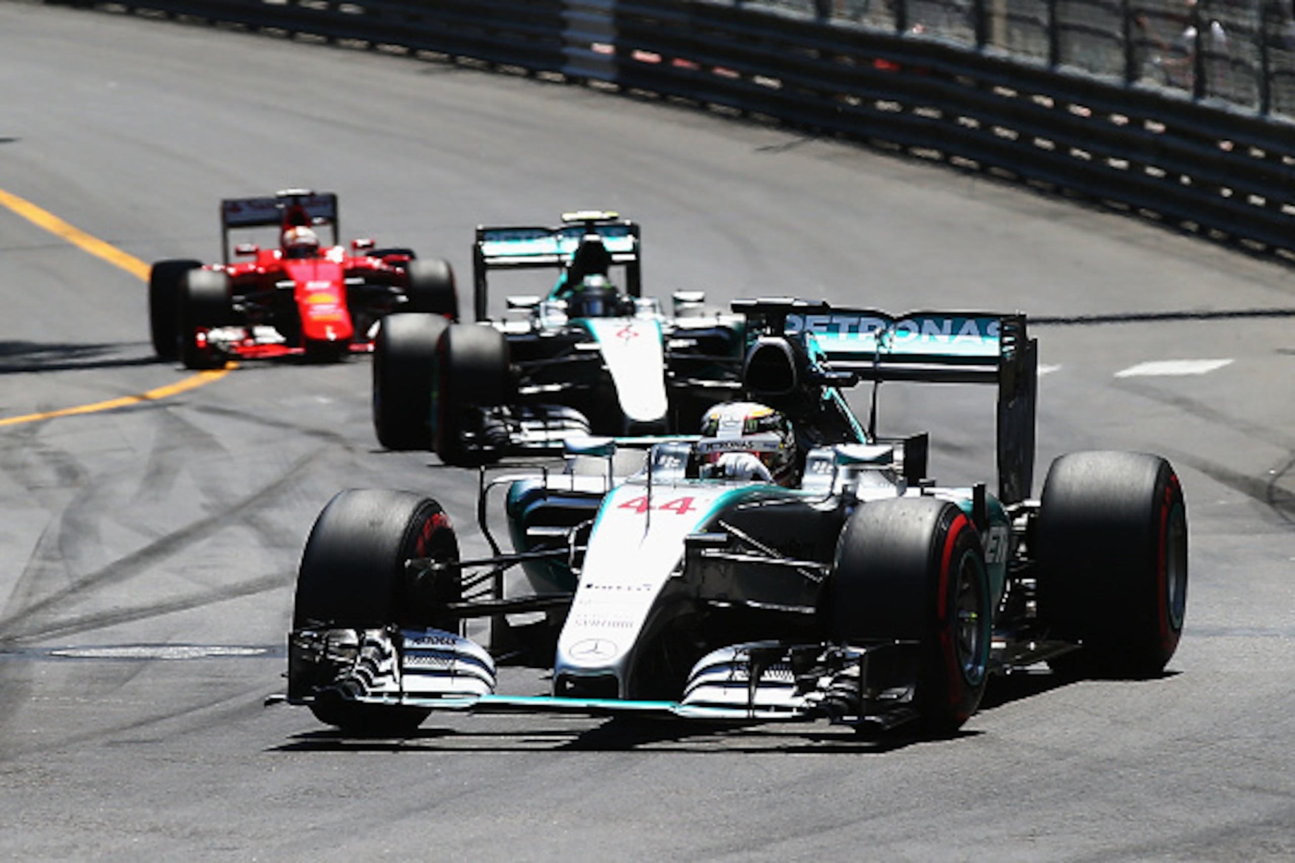 MONTE-CARLO, MONACO - MAY 24:  Lewis Hamilton of Great Britain and Mercedes GP leads from team mate Nico Rosberg of Germany and Mercedes GP and Sebastian Vettel of Germany and Ferrari during the Monaco Formula One Grand Prix at Circuit de Monaco on May 24