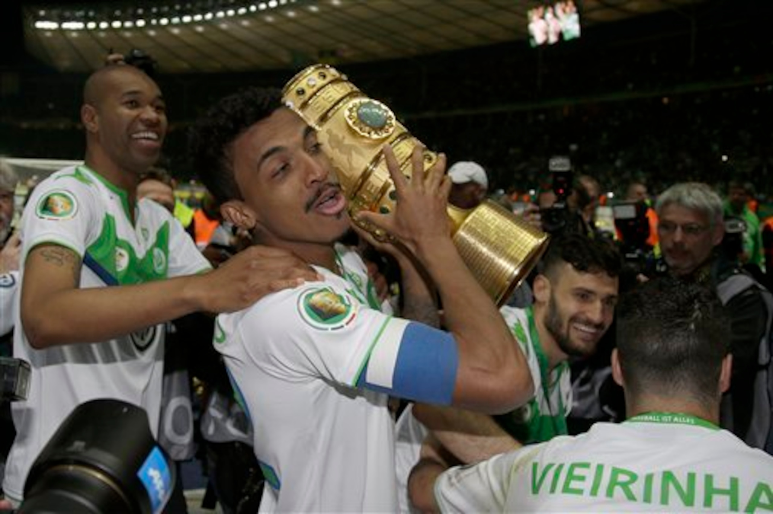 Gustavo celebrates winning the DFB-Pokal.