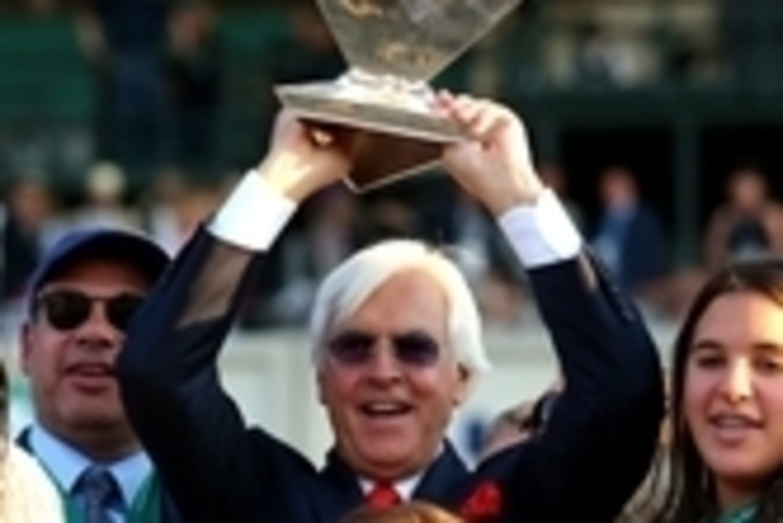 Jun 6, 2015; Elmont, NY, USA; Trainer Bob Baffert and owner Ahmed Zayat, in back, acknowledge the crowd after winning the 2015 Belmont Stakes at Belmont Park. Mandatory Credit: Brad Penner-USA TODAY Sports