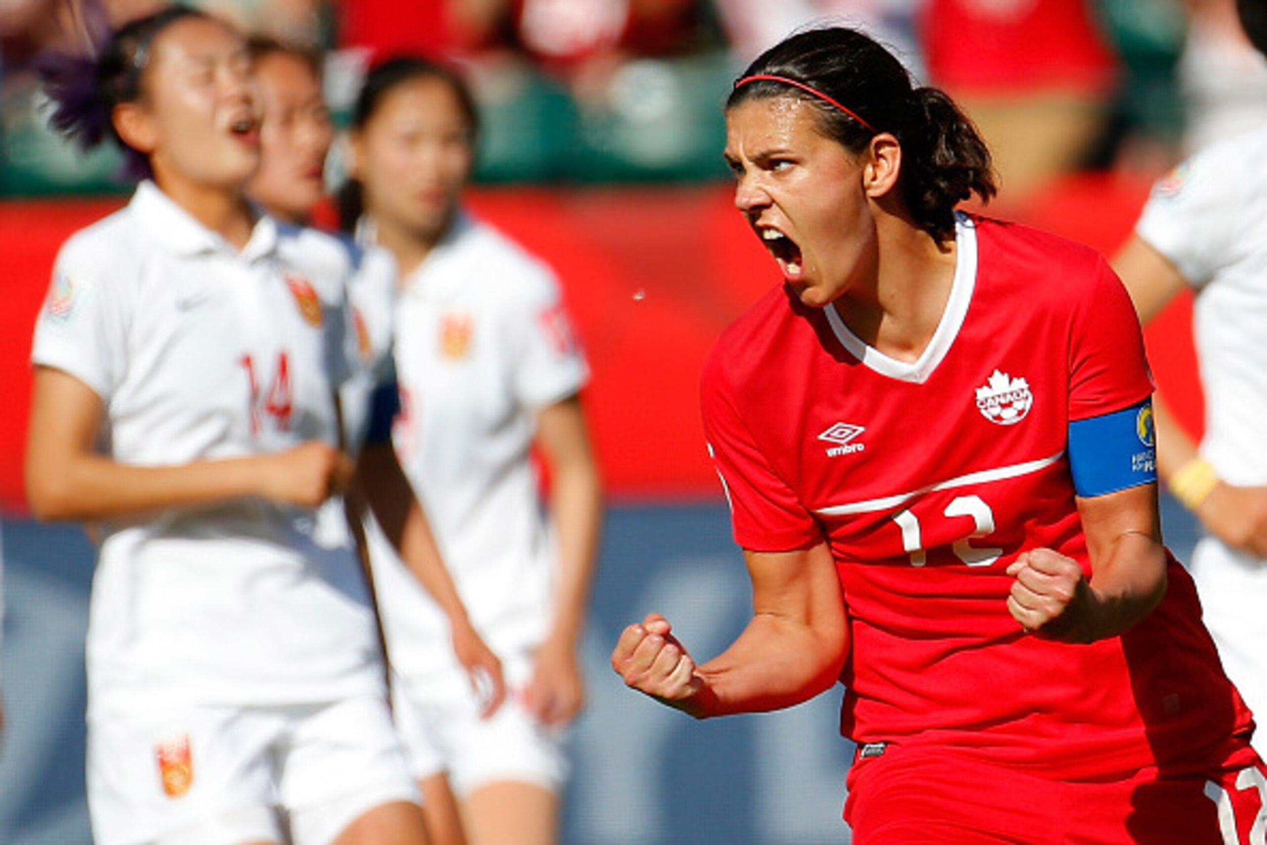 EDMONTON, AB - JUNE 06:  Christine Sinclair #12 of Canada reacts after scoring the go-ahead goal on a penalty kick in the final minutes against China during the FIFA Women's World Cup Canada 2015 Group A match between Canada and China PR at Commonwealth S