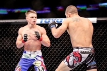 Jun 6, 2015; New Orleans, LA, USA; Chris Wade fights Christos Giagos during UFC Fight Night at the Smoothie King Center. Mandatory Credit: Derick E. Hingle-USA TODAY Sports