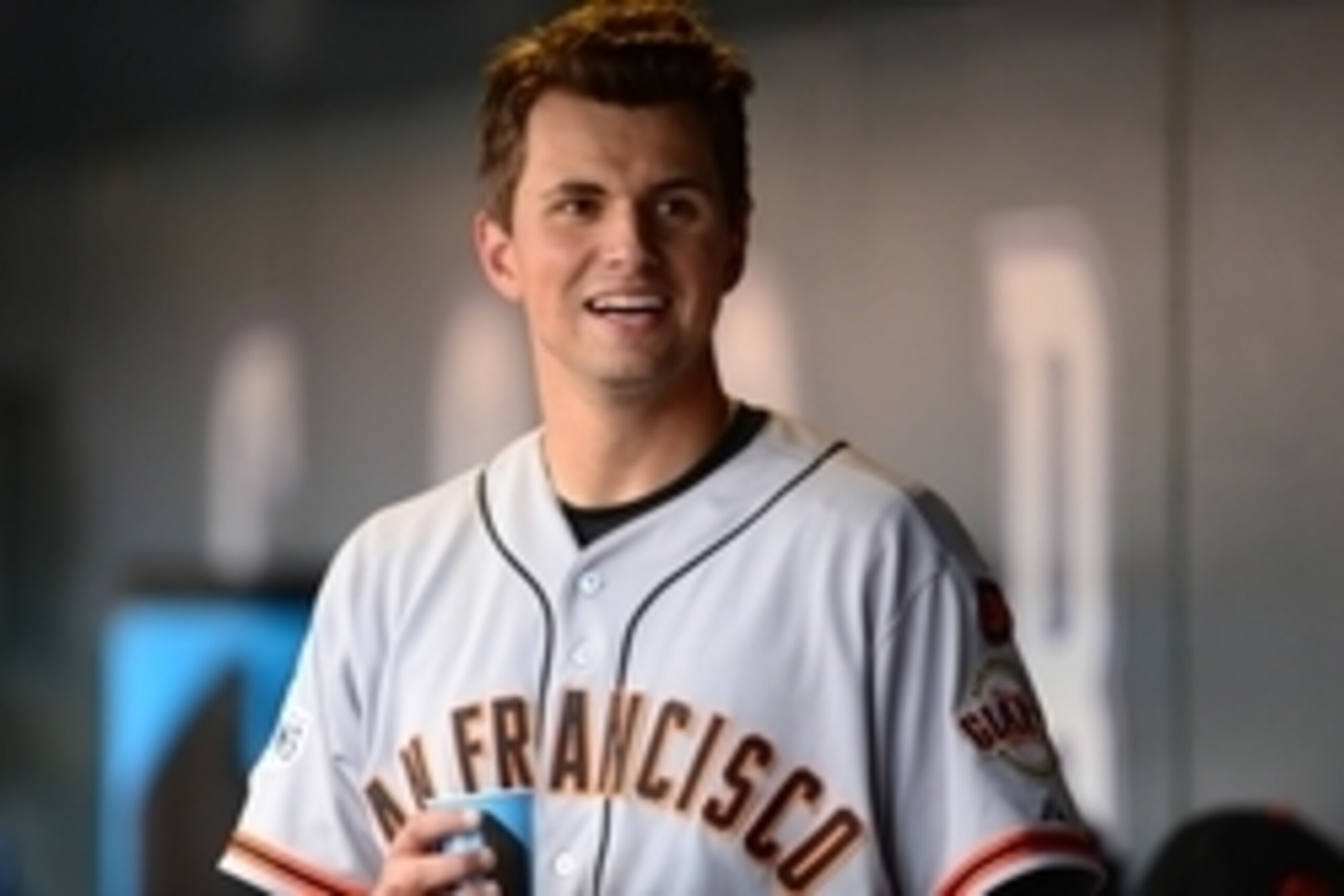 May 23, 2015; Denver, CO, USA; San Francisco Giants second baseman Joe Panik (12) reacts following scoring a run in the fifth inning against the Colorado Rockies at Coors Field. Mandatory Credit: Ron Chenoy-USA TODAY Sports