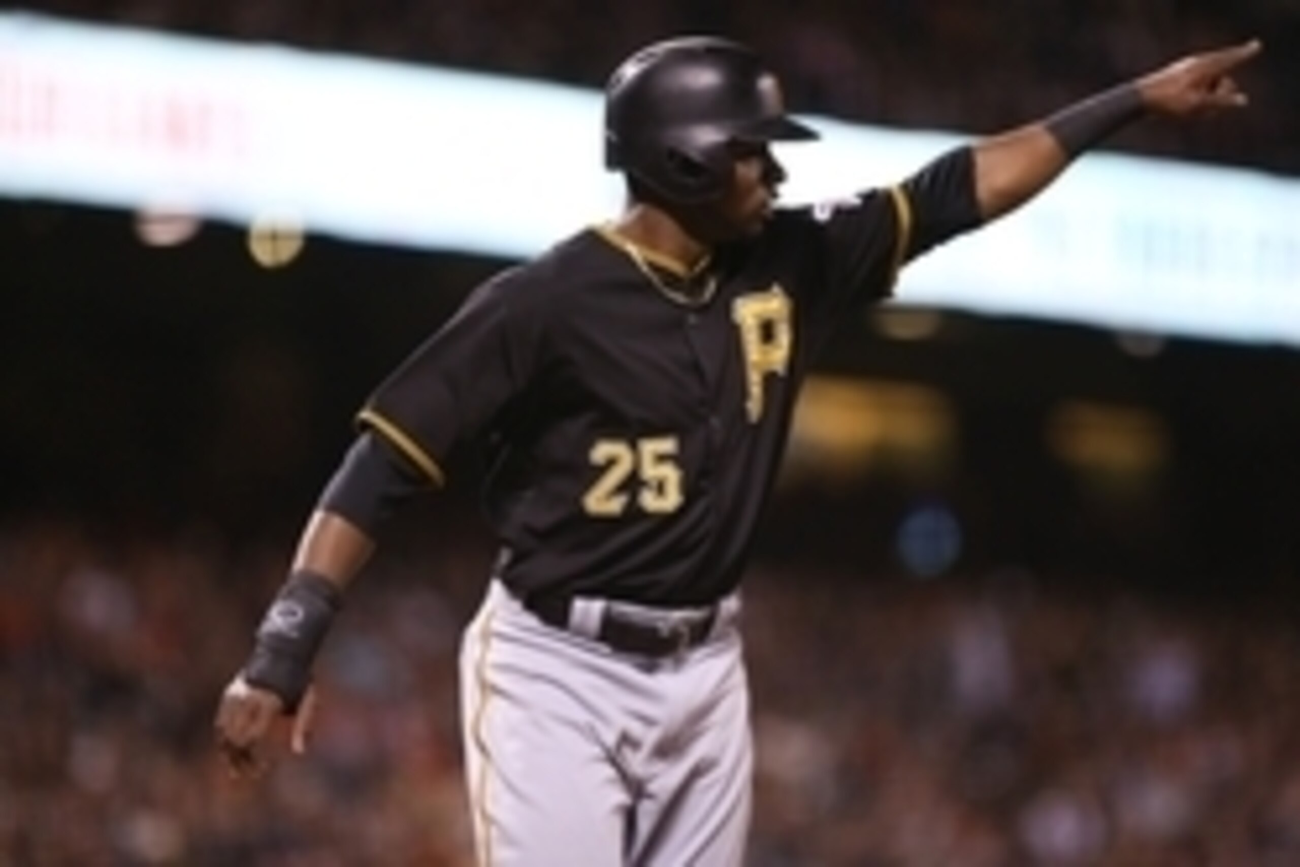 Jun 2, 2015; San Francisco, CA, USA; Pittsburgh Pirates right fielder Gregory Polanco (25) points toward center fielder Andrew McCutchen (not pictured) after being batted in on McCutchen RBI single against the San Francisco Giants during the sixth inning 