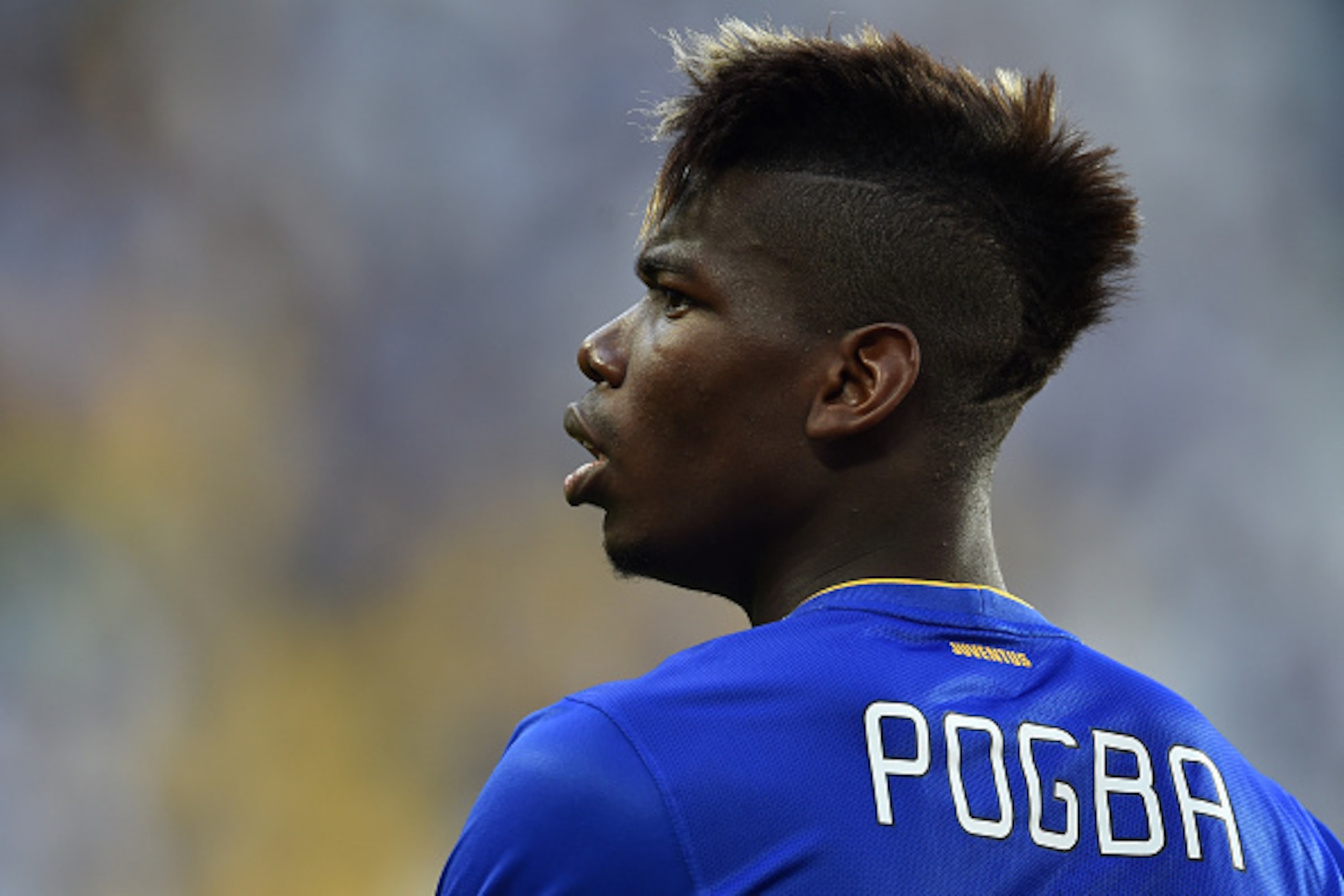 TURIN, ITALY - MAY 09:  Paul Pogba of Juventus FC looks on during the Serie A match between Juventus FC and Cagliari Calcio at Juventus Arena on May 09, 2015 in Turin, Italy.  (Photo by Valerio Pennicino/Getty Images)