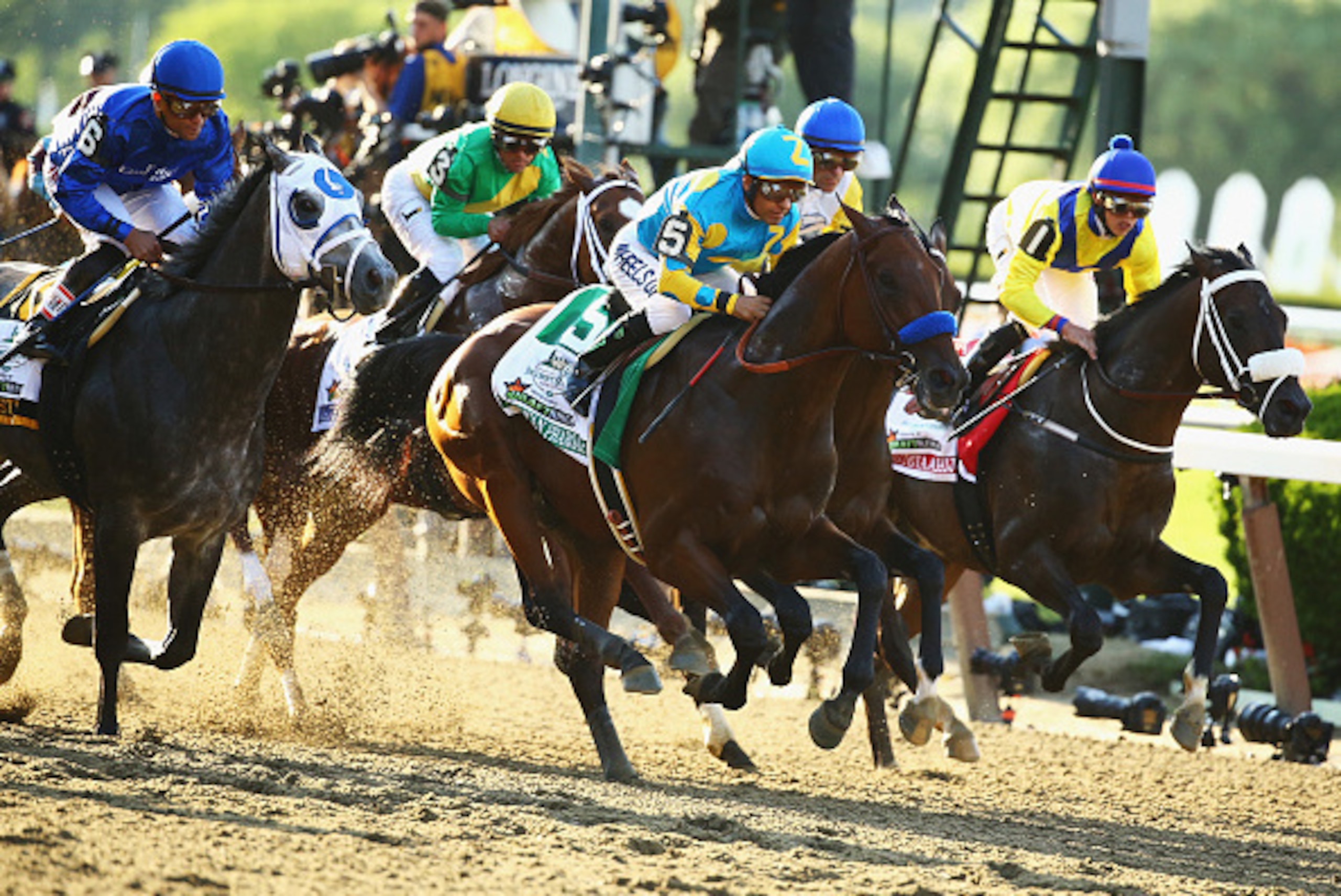 ELMONT, NY - JUNE 06:  Victor Espinoza rides atop American Pharoah #5 during the 147th running of the Belmont Stakes  at Belmont Park on June 6, 2015 in Elmont, New York.  (Photo by Al Bello/Getty Images)