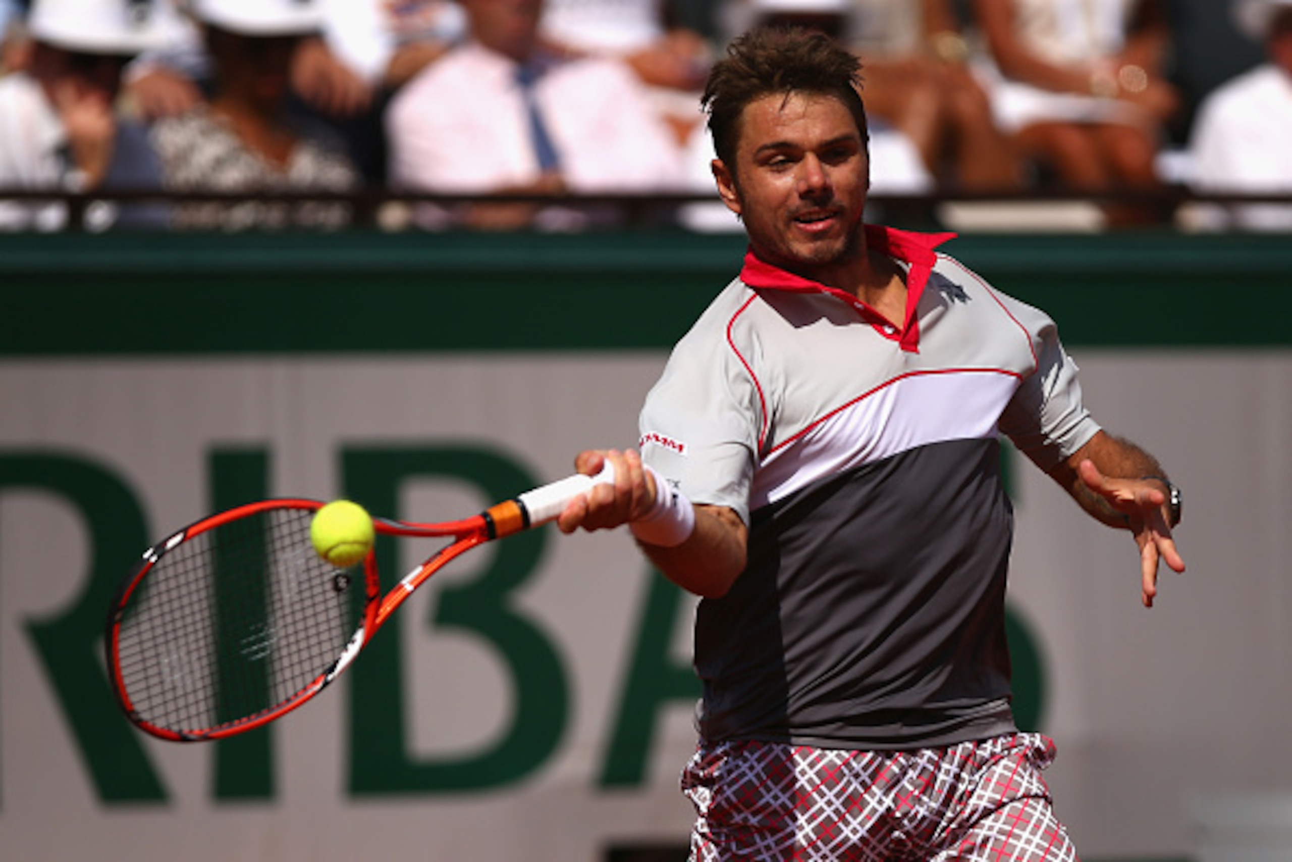 PARIS, FRANCE - JUNE 07:  Stanislas Wawrinka of Switzerland  plays a forehand in the Men's Singles Final against Novak Djokovic of Serbia on day fifteen of the 2015 French Open at Roland Garros on June 7, 2015 in Paris, France.  (Photo by Dan Istitene/Get
