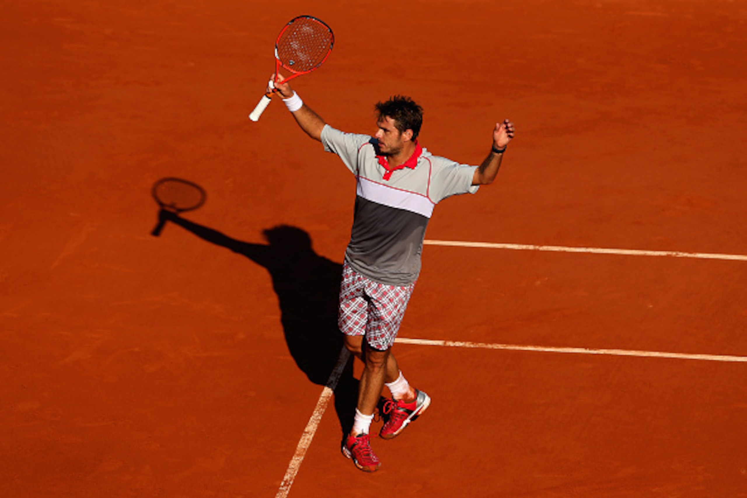 PARIS, FRANCE - JUNE 07: Stanislas Wawrinka of Switzerland celebrates match point in the Men's Singles Final against Novak Djokovic of Serbia on day fifteen of the 2015 French Open at Roland Garros on June 7, 2015 in Paris, France. (Photo by Clive Bruns PARIS, FRANCE - JUNE 07: Stanislas Wawrinka of Switzerland celebrates match point in the Men's Singles Final against Novak Djokovic of Serbia on day fifteen of the 2015 French Open at Roland Garros on June 7, 2015 in Paris, France. (Photo by Clive Bruns
