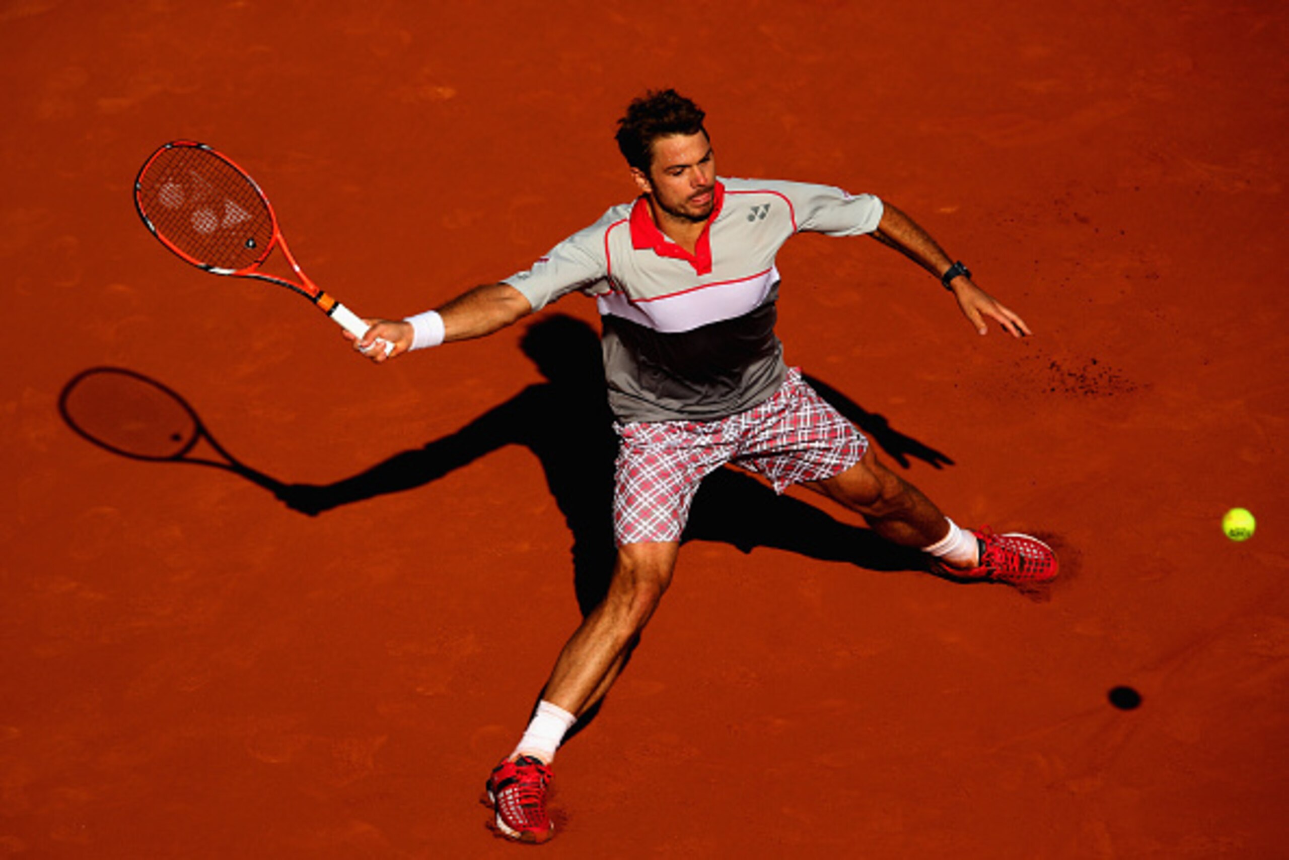 PARIS, FRANCE - JUNE 07: Stanislas Wawrinka of Switzerland returns a shot in the Men's Singles Final against Novak Djokovic of Serbia on day fifteen of the 2015 French Open at Roland Garros on June 7, 2015 in Paris, France. (Photo by Clive Brunskill/Get PARIS, FRANCE - JUNE 07: Stanislas Wawrinka of Switzerland returns a shot in the Men's Singles Final against Novak Djokovic of Serbia on day fifteen of the 2015 French Open at Roland Garros on June 7, 2015 in Paris, France. (Photo by Clive Brunskill/Get