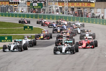 MONTREAL, QC - JUNE 07:  Lewis Hamilton of Great Britain and Mercedes GP leads into the first corner during the Canadian Formula One Grand Prix at Circuit Gilles Villeneuve on June 7, 2015 in Montreal, Canada.  (Photo by Mark Thompson/Getty Images)