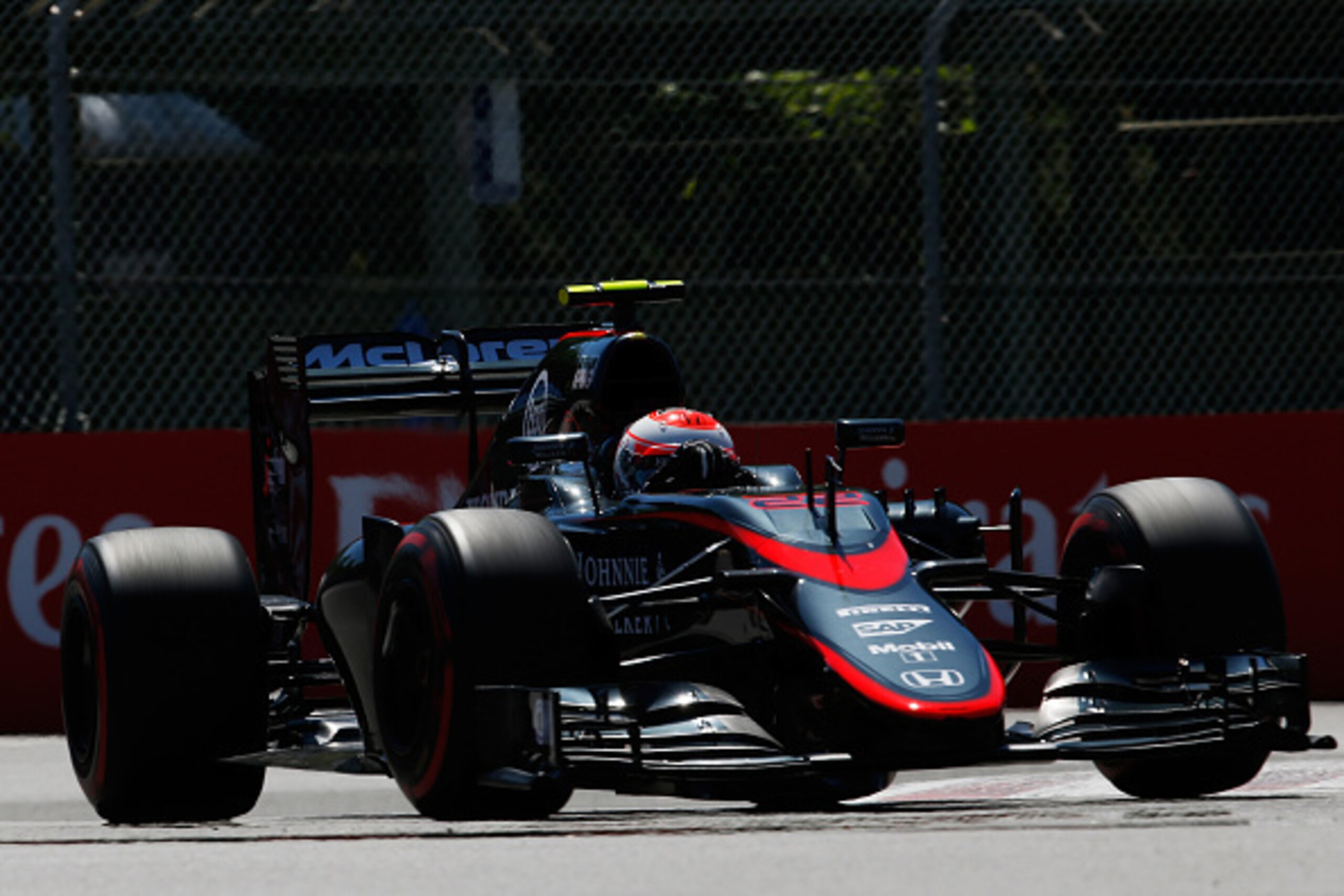 MONTREAL, QC - JUNE 06:  Jenson Button of Great Britain and McLaren Honda drives during final practice for the Canadian Formula One Grand Prix at Circuit Gilles Villeneuve on June 6, 2015 in Montreal, Canada.  (Photo by Charles Coates/Getty Images)