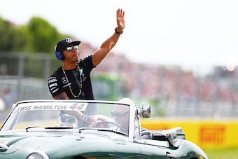 MONTREAL, QC - JUNE 07:  Lewis Hamilton of Great Britain and Mercedes GP waves to the fans prior to the Canadian Formula One Grand Prix at Circuit Gilles Villeneuve on June 7, 2015 in Montreal, Canada.  (Photo by Clive Mason/Getty Images)